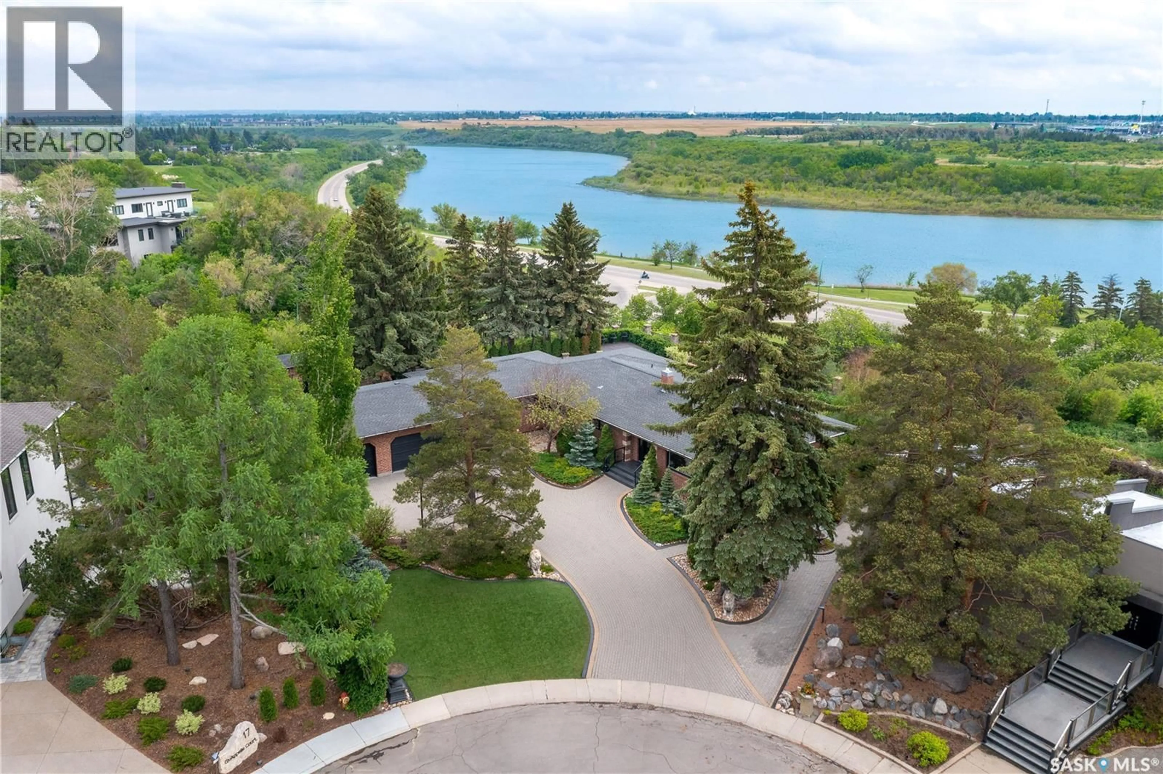 A pic from outside/outdoor area/front of a property/back of a property/a pic from drone, water/lake/river/ocean view for 15 QUAPPELLE COURT, Saskatoon Saskatchewan S7K1C2