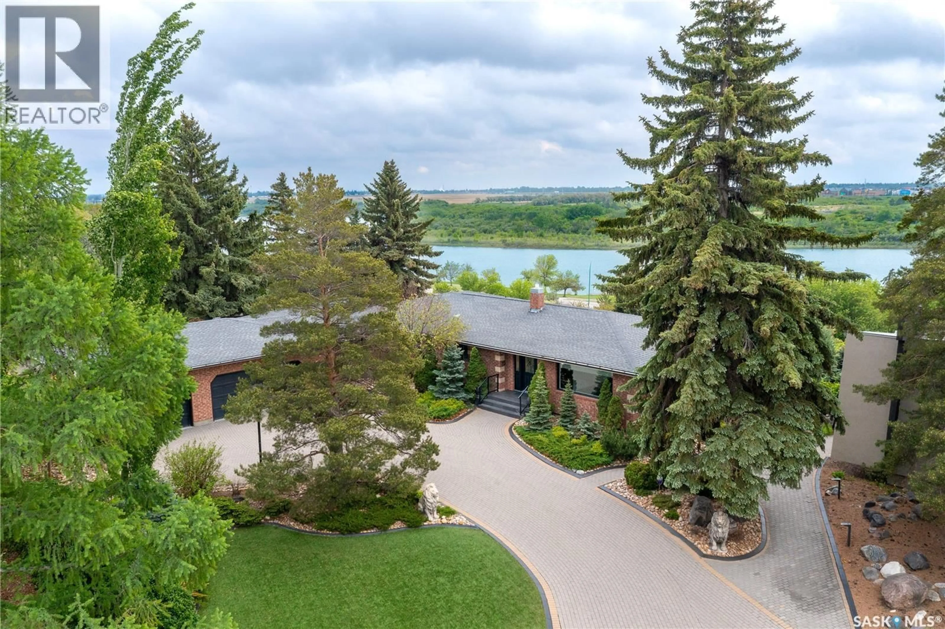 A pic from outside/outdoor area/front of a property/back of a property/a pic from drone, water/lake/river/ocean view for 15 QUAPPELLE COURT, Saskatoon Saskatchewan S7K1C2