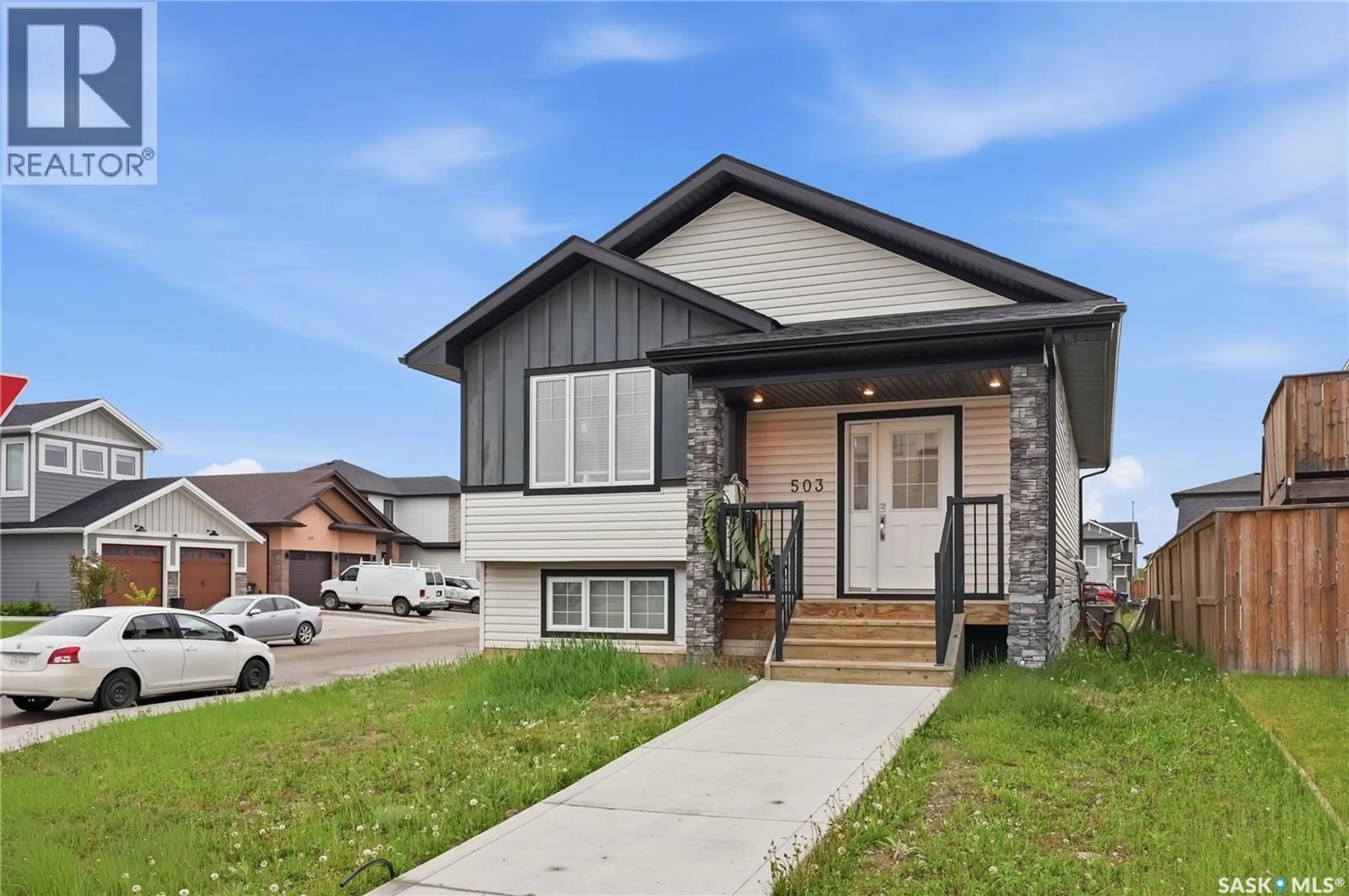 Home with vinyl exterior material, street for 503 FAST WAY, Saskatoon Saskatchewan S7P0B6