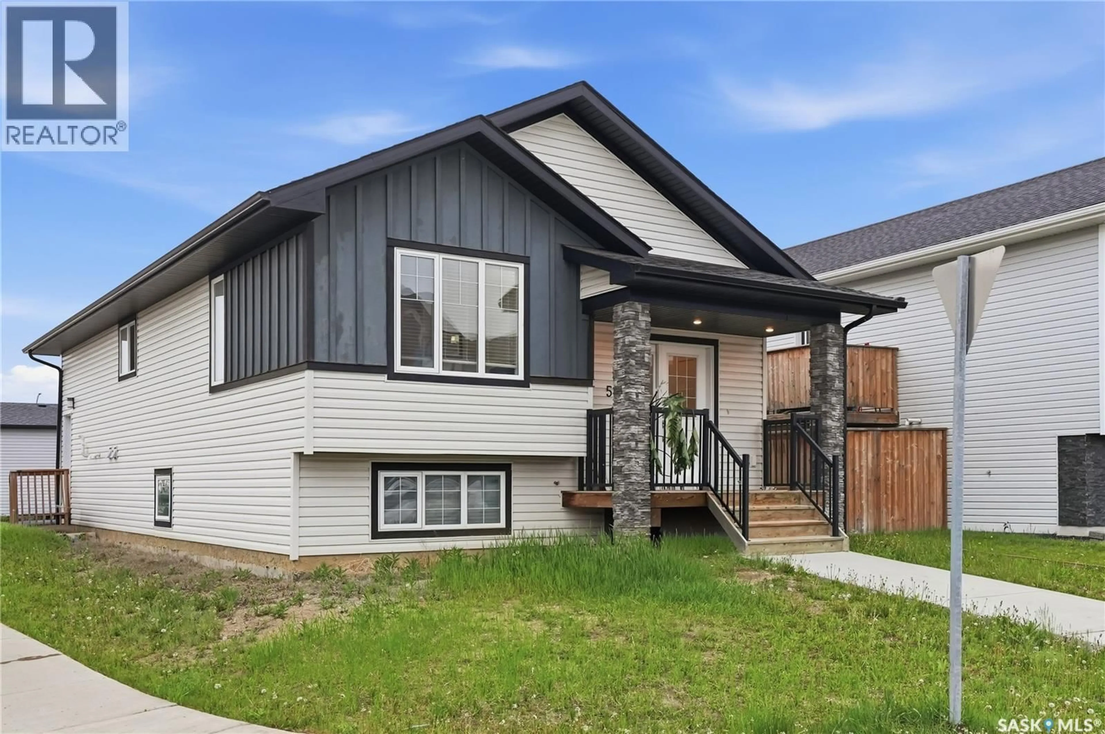 Home with vinyl exterior material, street for 503 FAST WAY, Saskatoon Saskatchewan S7P0B6
