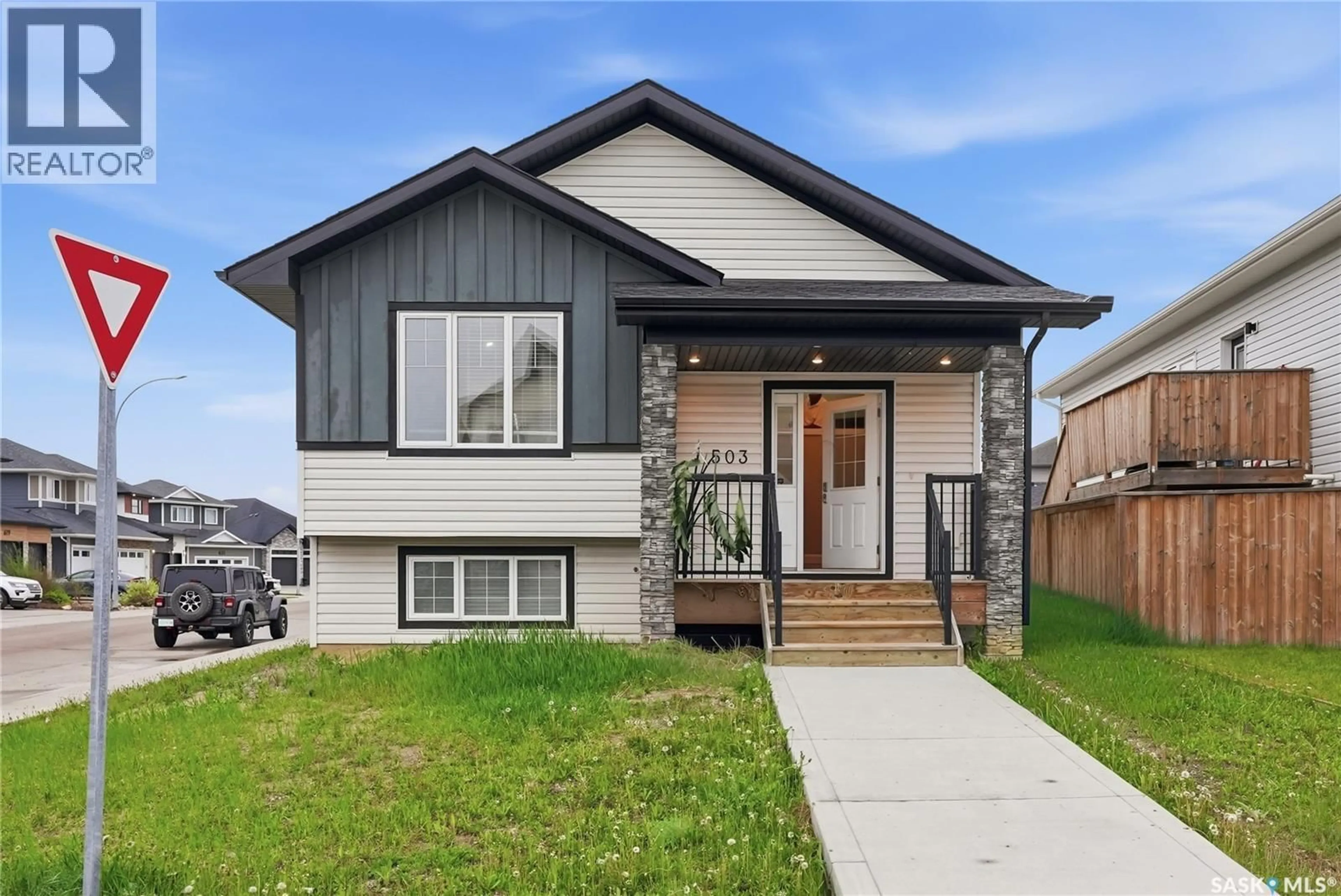 Home with vinyl exterior material, street for 503 FAST WAY, Saskatoon Saskatchewan S7P0B6