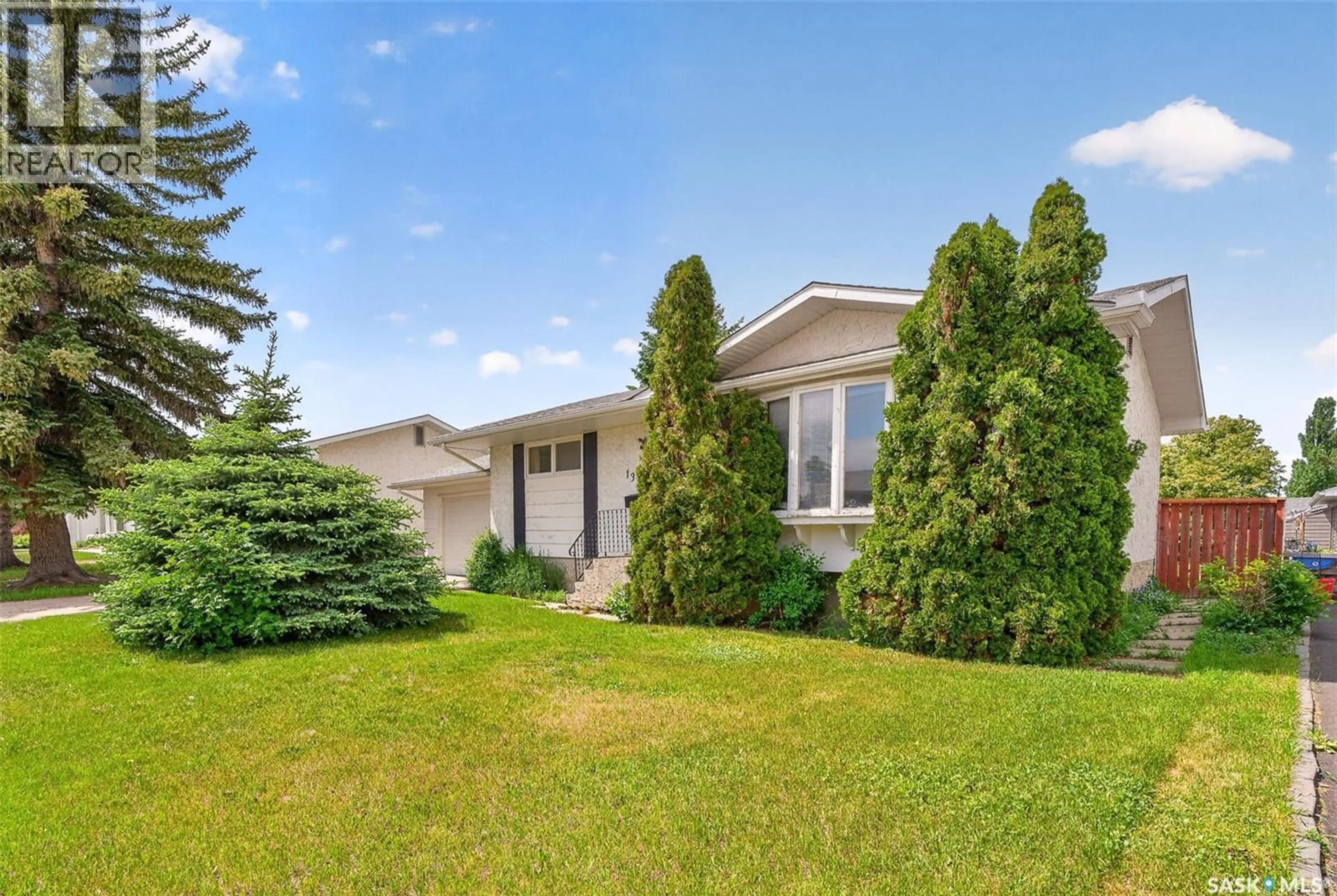 Home with vinyl exterior material, street for 1373 PRINCE CRESCENT, Moose Jaw Saskatchewan S6H6E6