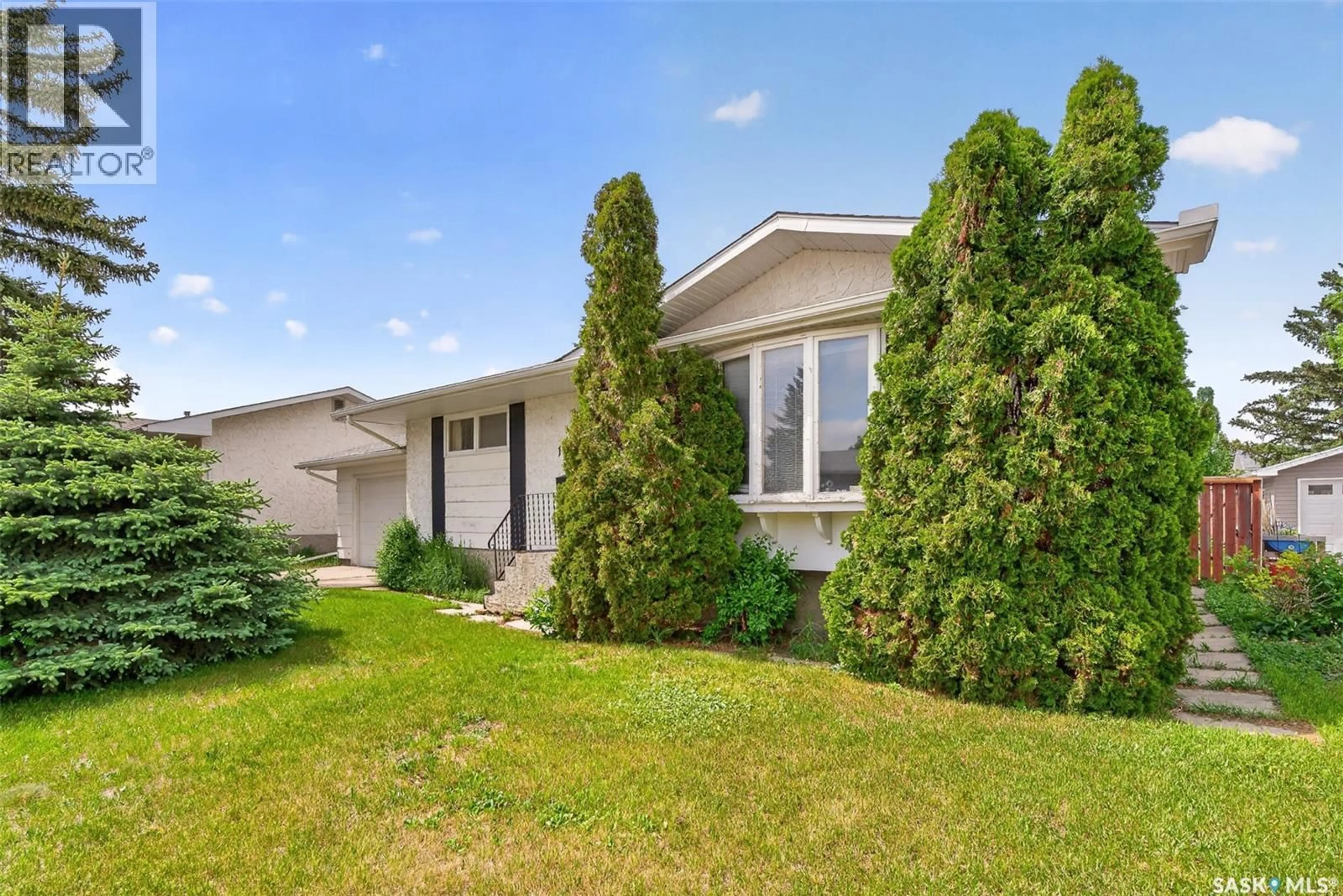 Home with vinyl exterior material, street for 1373 PRINCE CRESCENT, Moose Jaw Saskatchewan S6H6E6