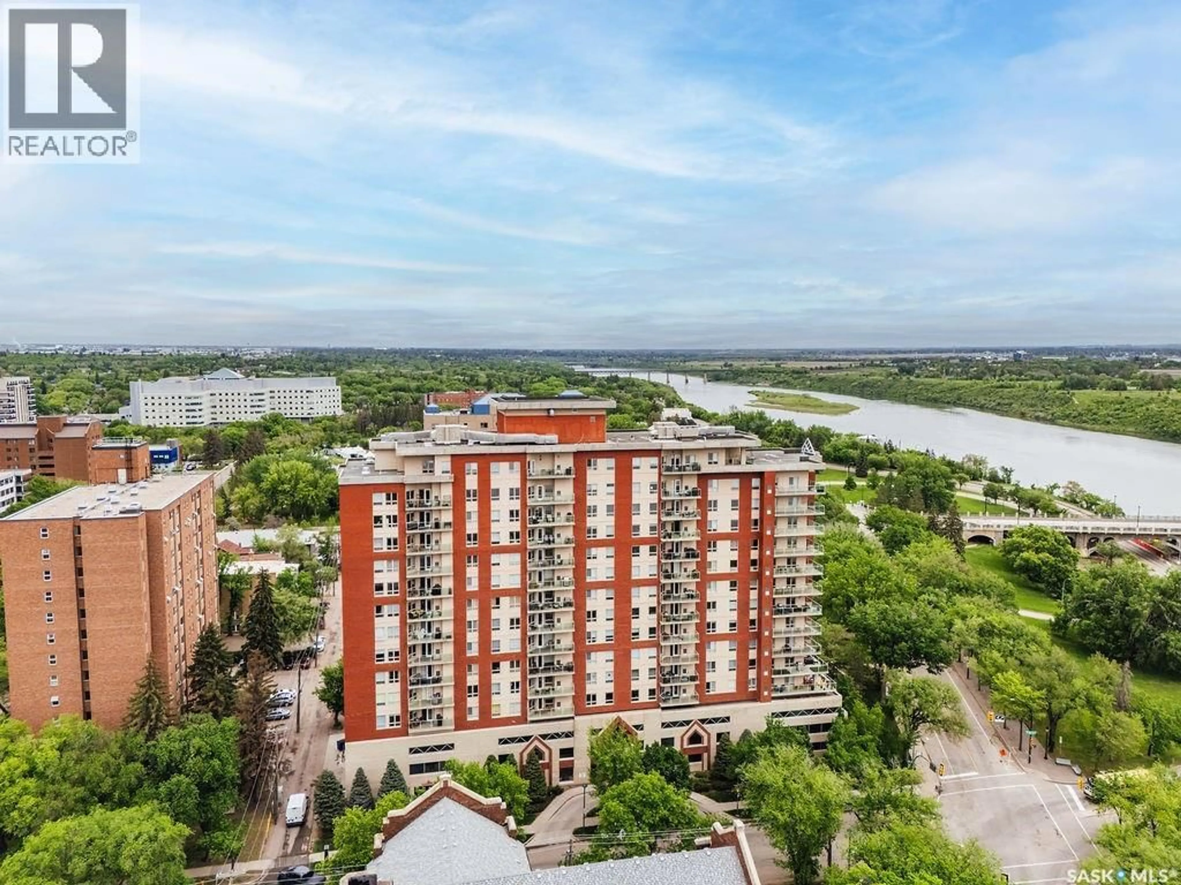 A pic from outside/outdoor area/front of a property/back of a property/a pic from drone, water/lake/river/ocean view for 902 - 409 SPADINA CRESCENT, Saskatoon Saskatchewan S7K0G8