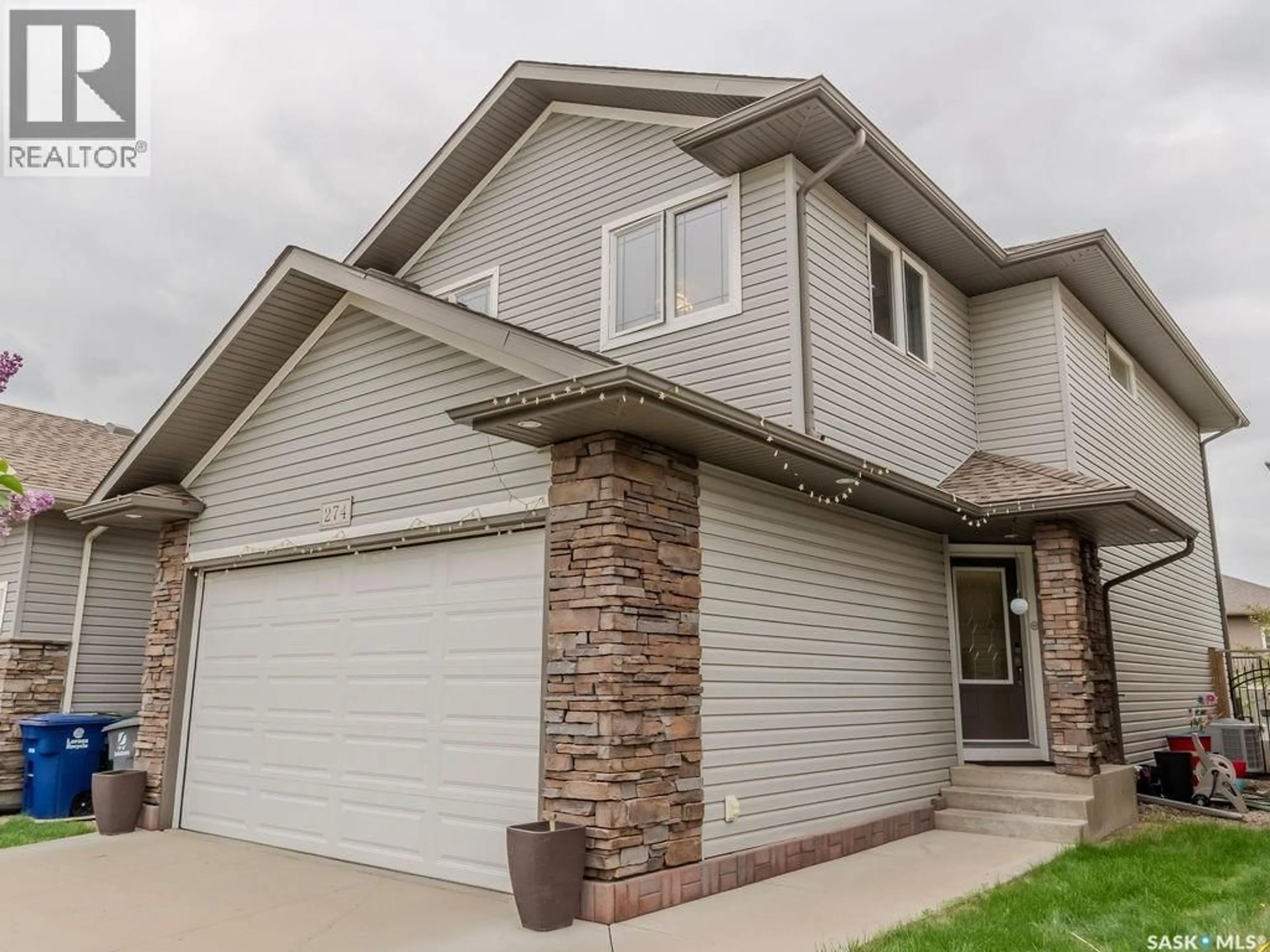 Home with brick exterior material, street for 274 ASHWORTH CRESCENT, Saskatoon Saskatchewan S7T0P1