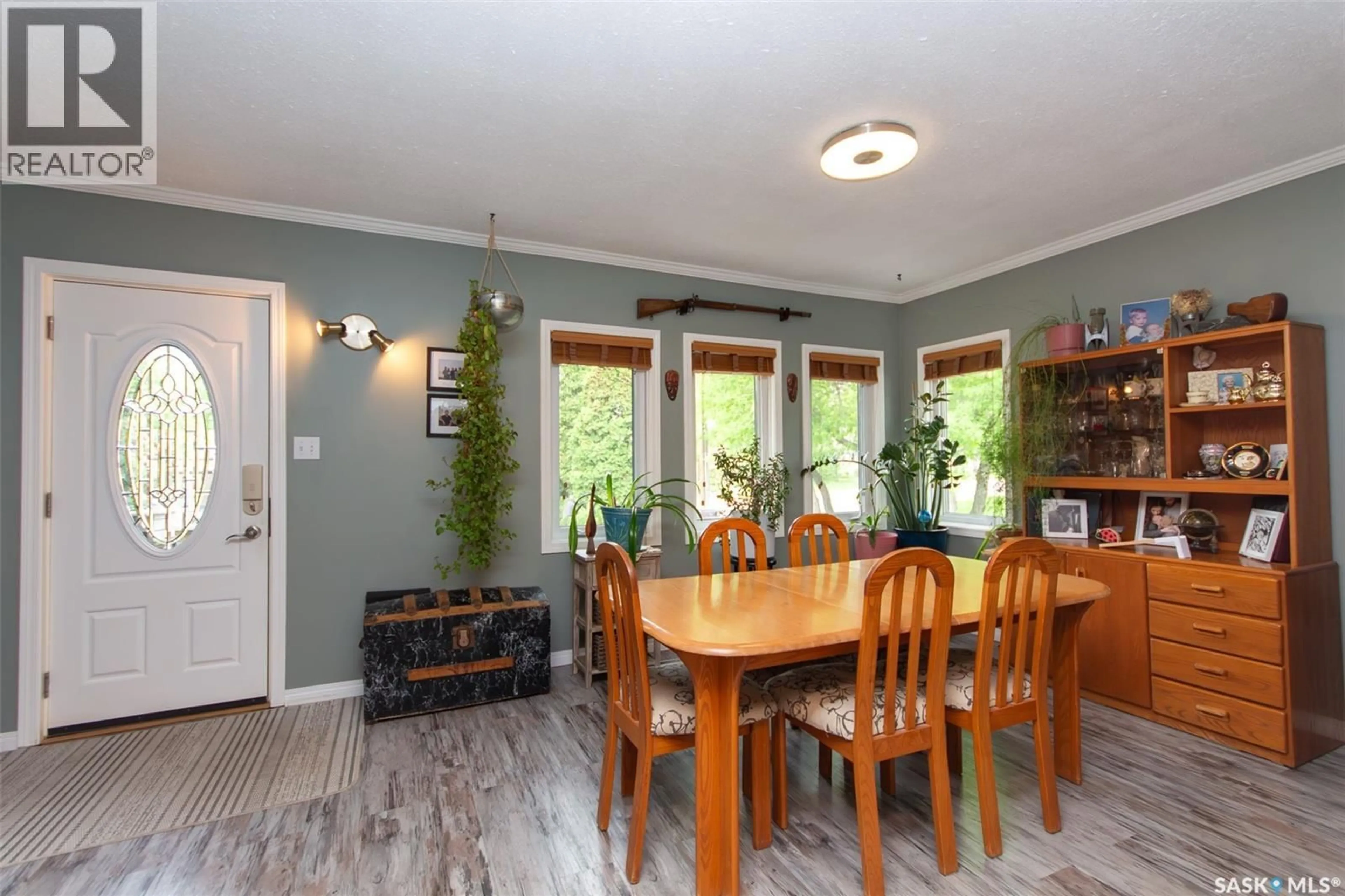 Dining room, wood/laminate floor for 1062 112TH STREET, North Battleford Saskatchewan S9A2L3