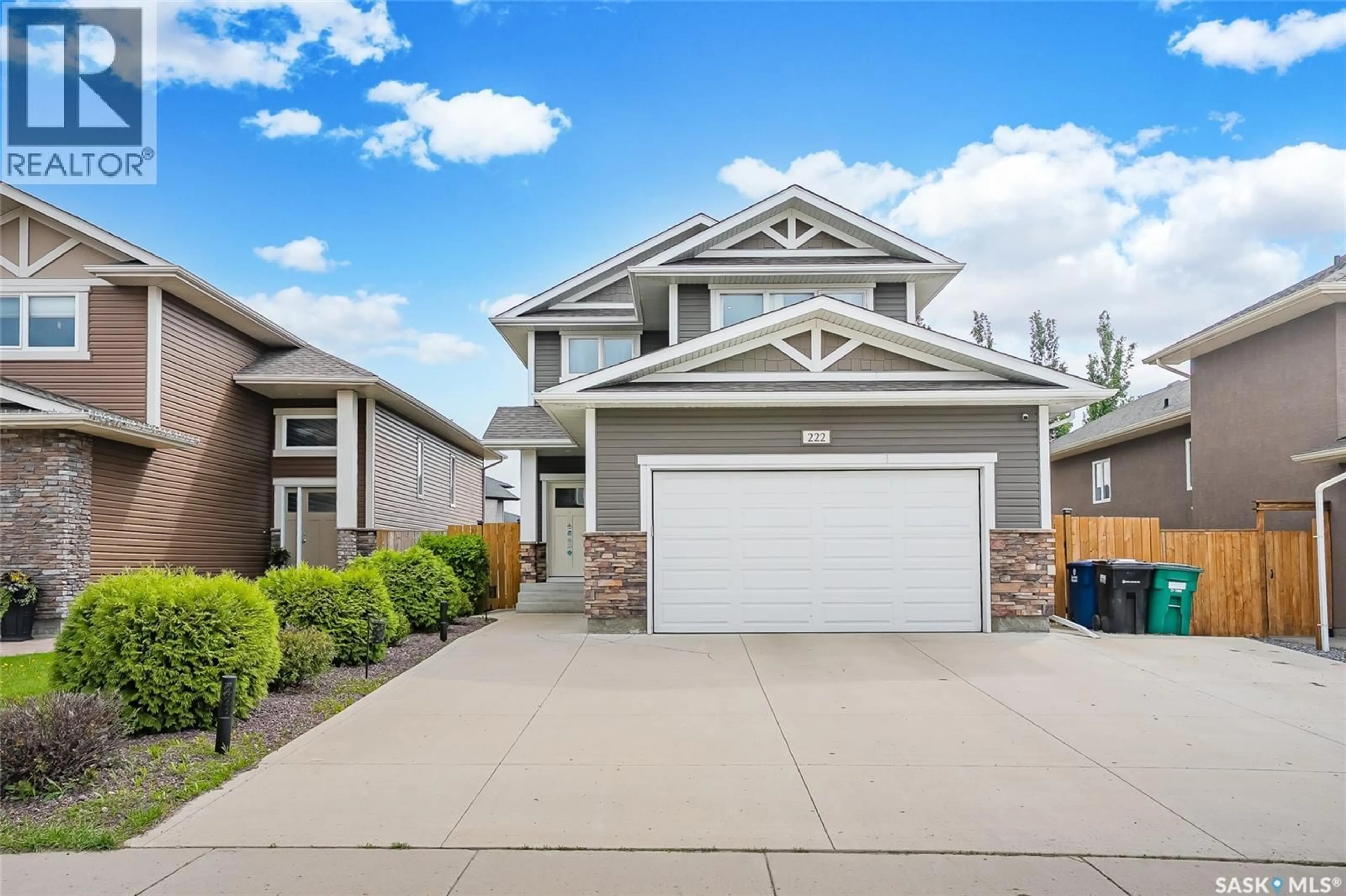 Home with vinyl exterior material, street for 222 PRINGLE LANE, Saskatoon Saskatchewan S7T0S3