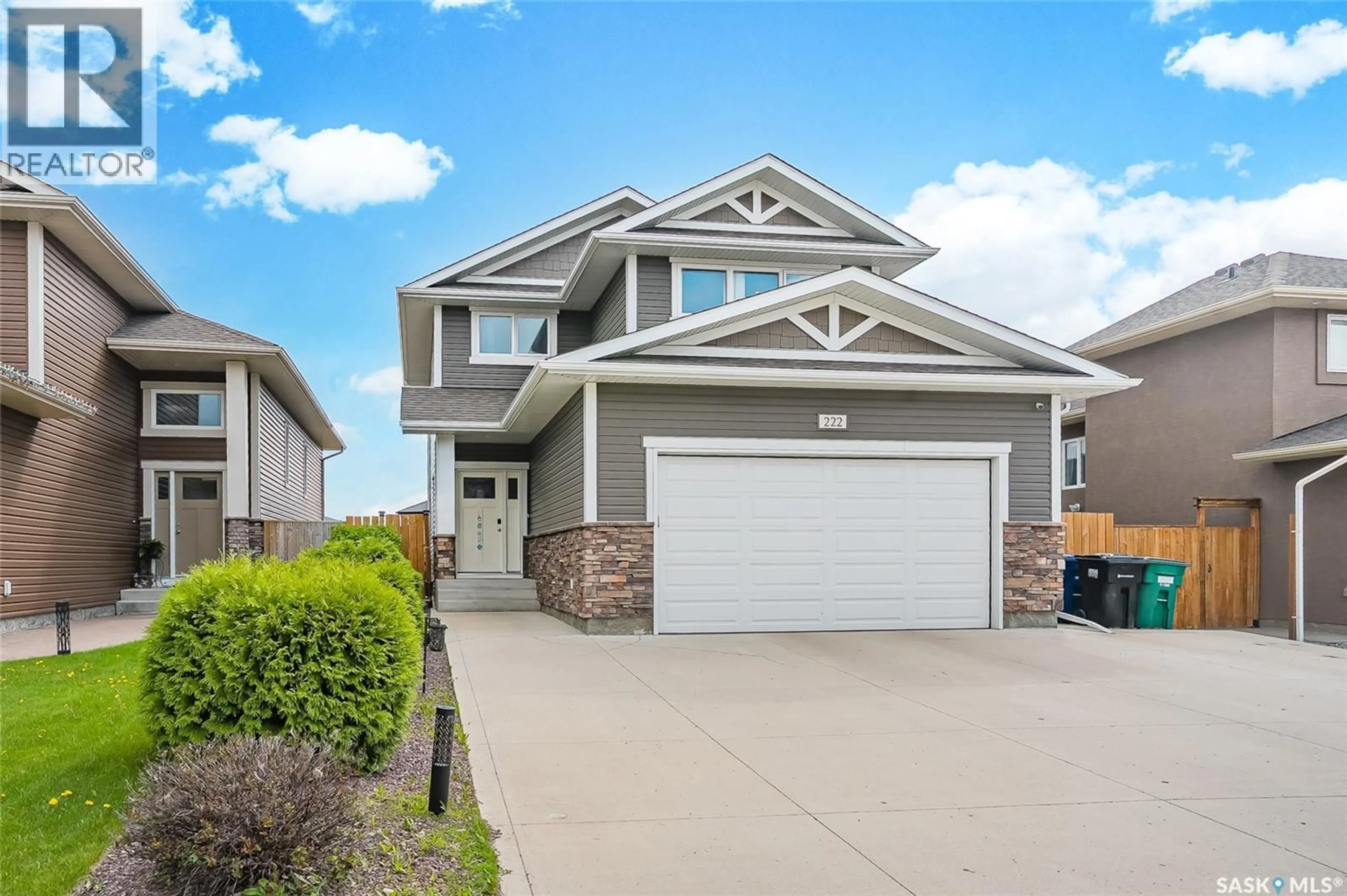 Home with vinyl exterior material, street for 222 PRINGLE LANE, Saskatoon Saskatchewan S7T0S3