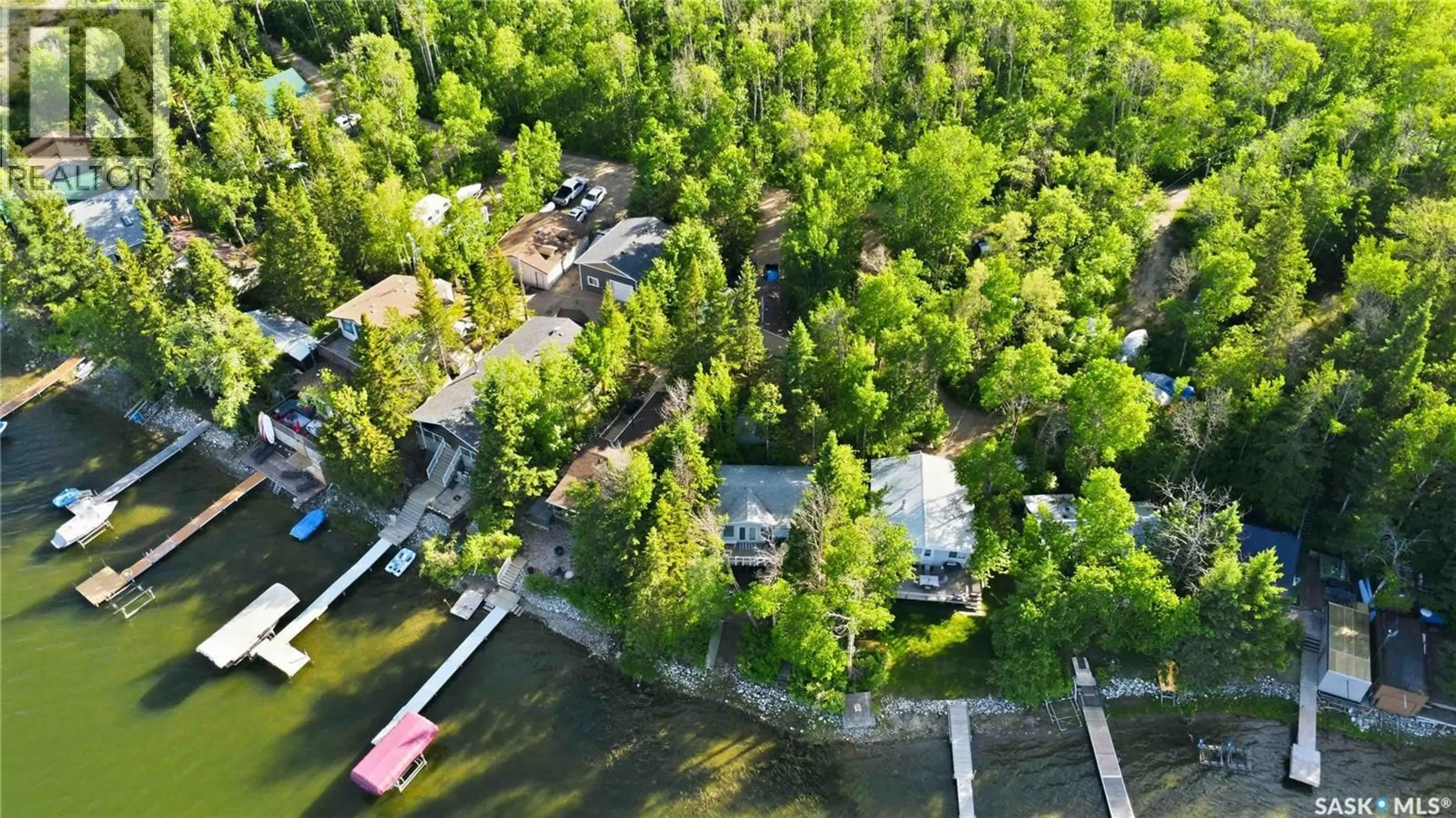A pic from outside/outdoor area/front of a property/back of a property/a pic from drone, water/lake/river/ocean view for 9 WOODLAND AVENUE, Lac la Pêche Saskatchewan S0J2G0