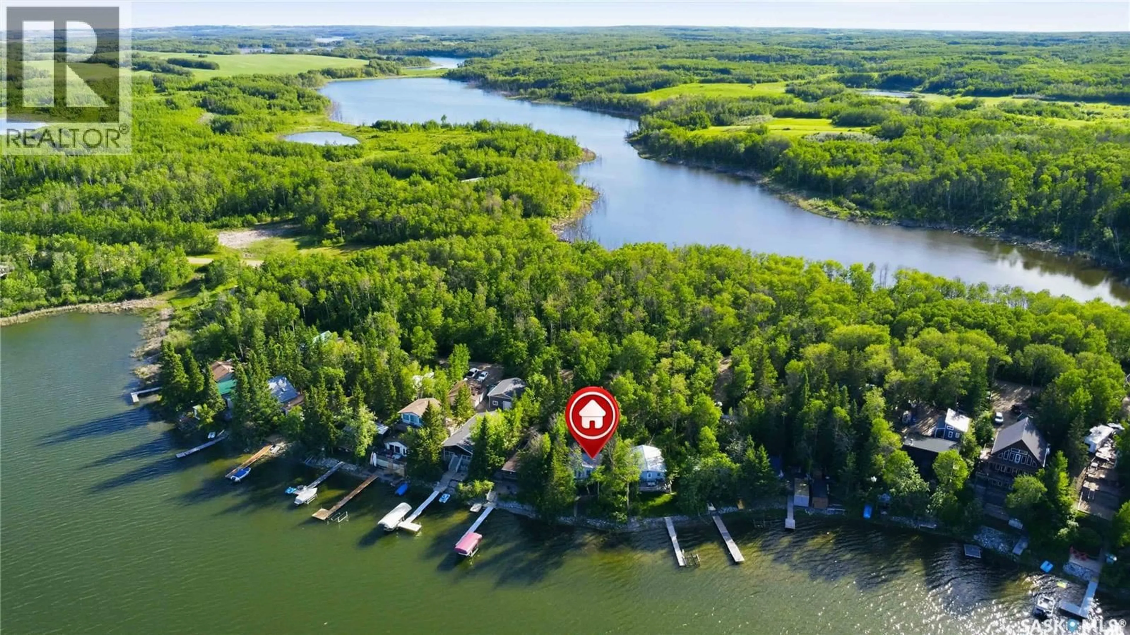 A pic from outside/outdoor area/front of a property/back of a property/a pic from drone, water/lake/river/ocean view for 9 WOODLAND AVENUE, Lac la Pêche Saskatchewan S0J2G0