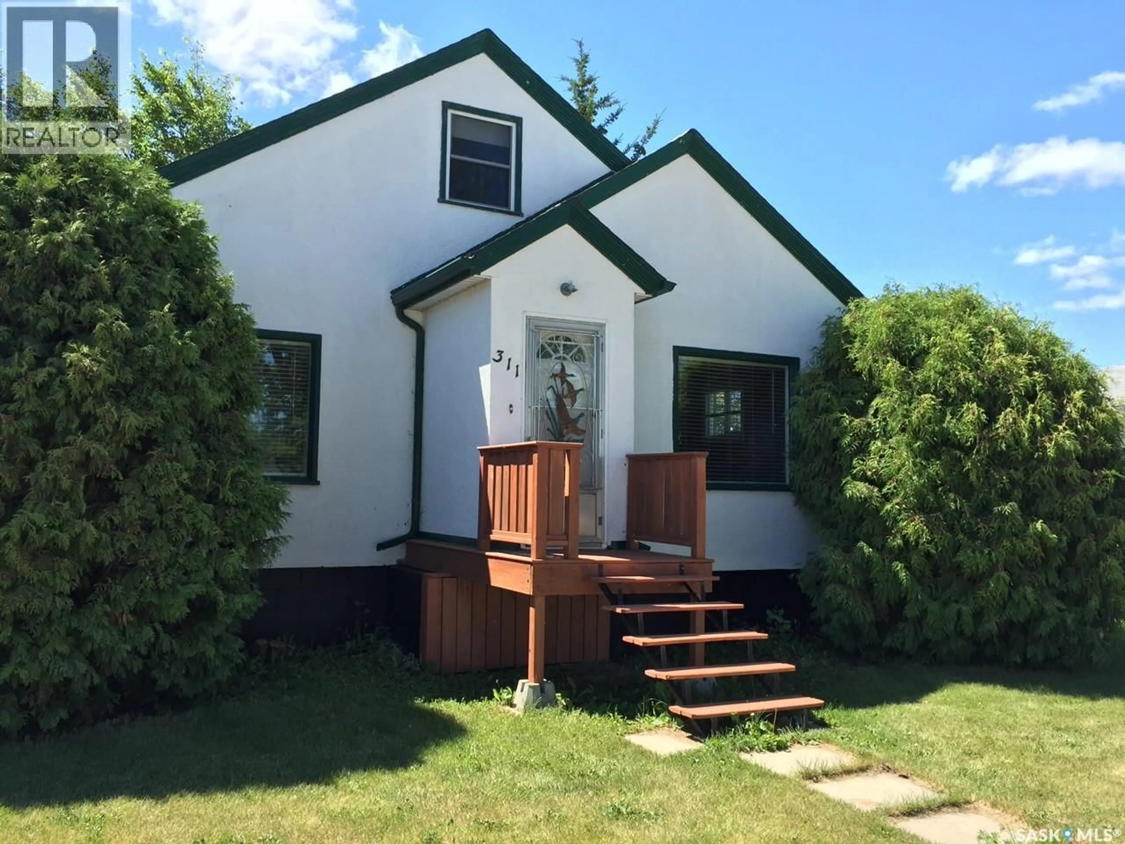 Home with vinyl exterior material, street for 311 1ST STREET, Wakaw Saskatchewan S0K4P0