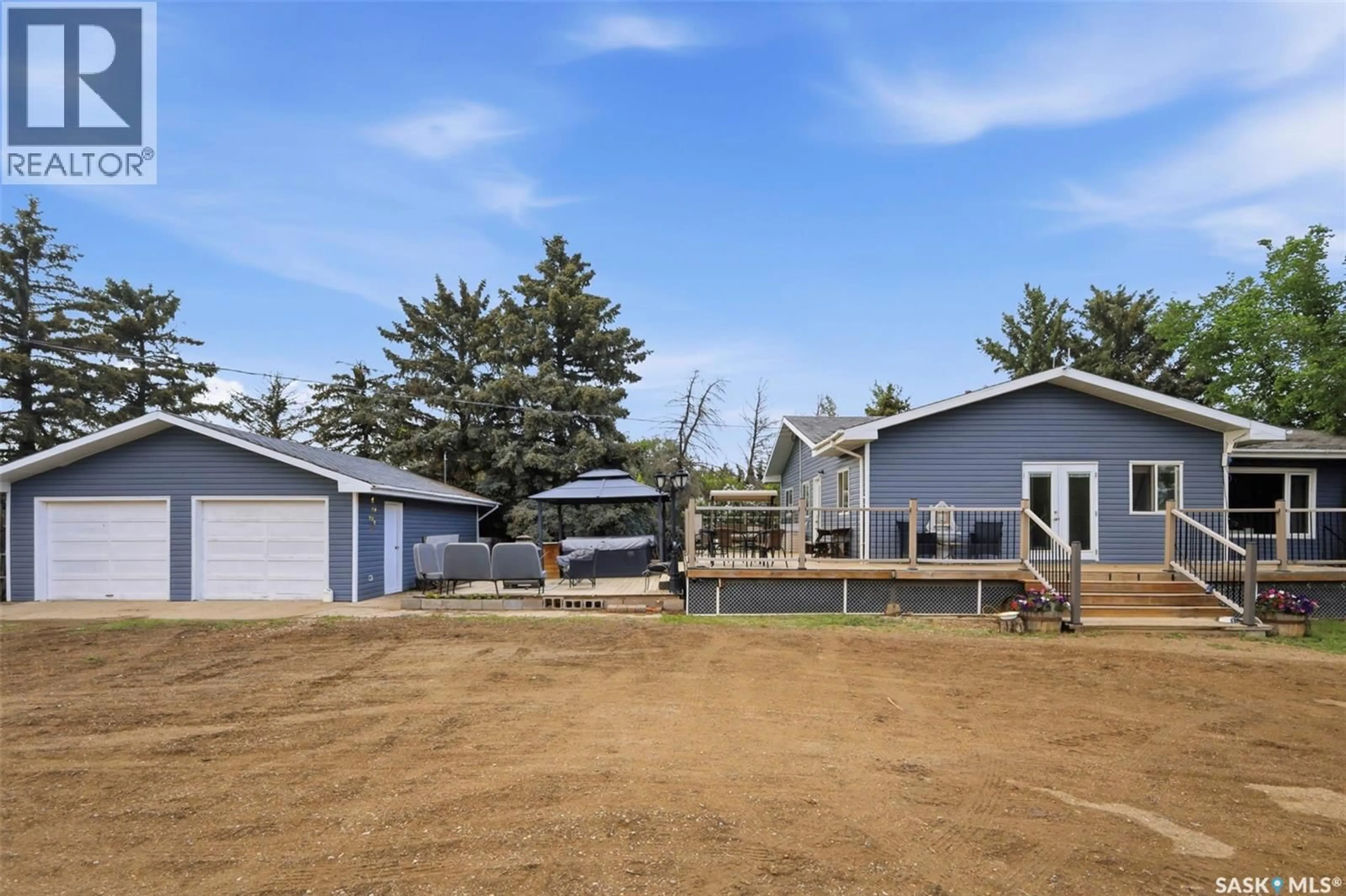 A pic from outside/outdoor area/front of a property/back of a property/a pic from drone, unknown for ELSTAD ACREAGE, Monet Rm No. 257 Saskatchewan S0L3M0