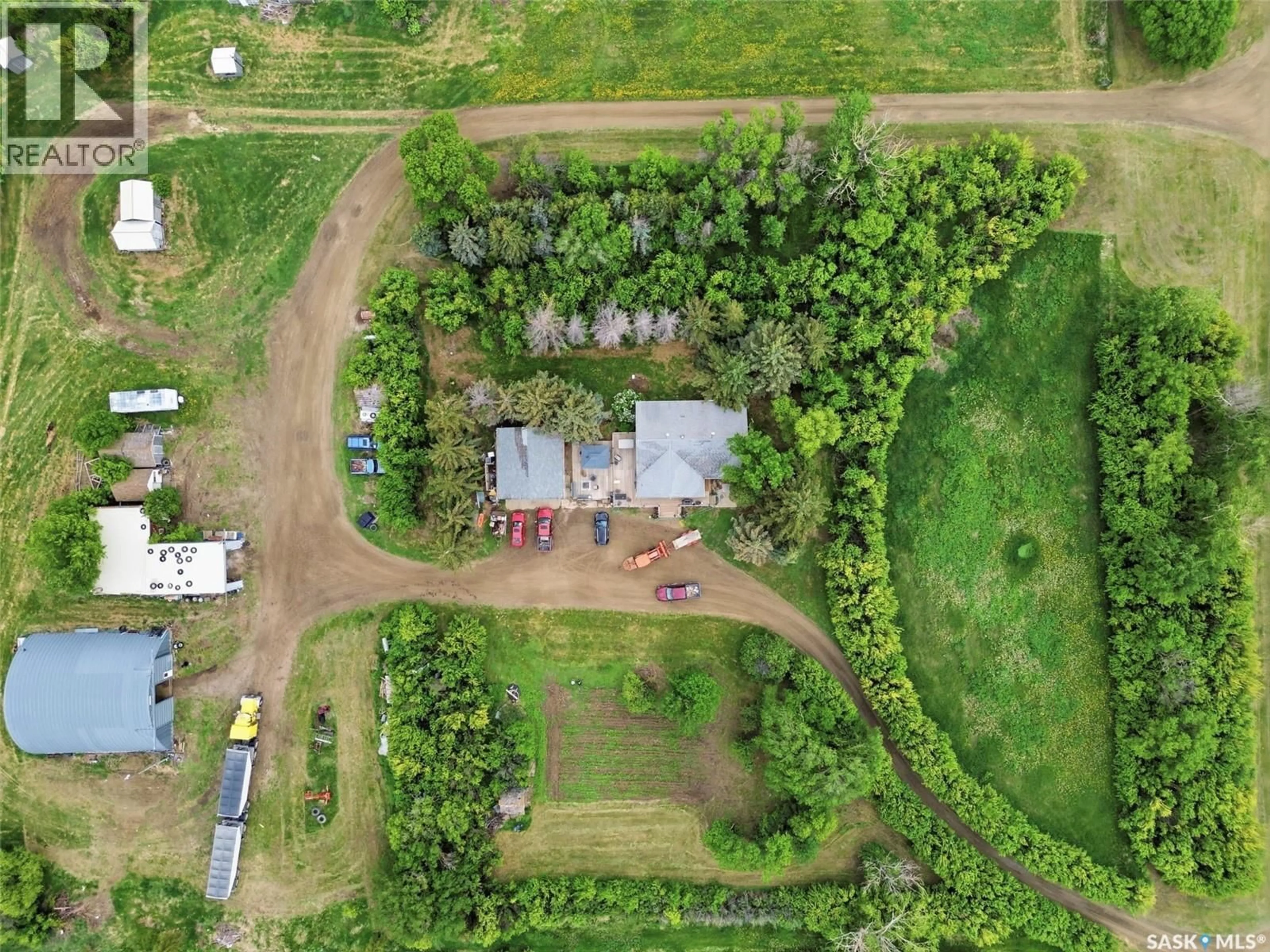 A pic from outside/outdoor area/front of a property/back of a property/a pic from drone, unknown for ELSTAD ACREAGE, Monet Rm No. 257 Saskatchewan S0L3M0