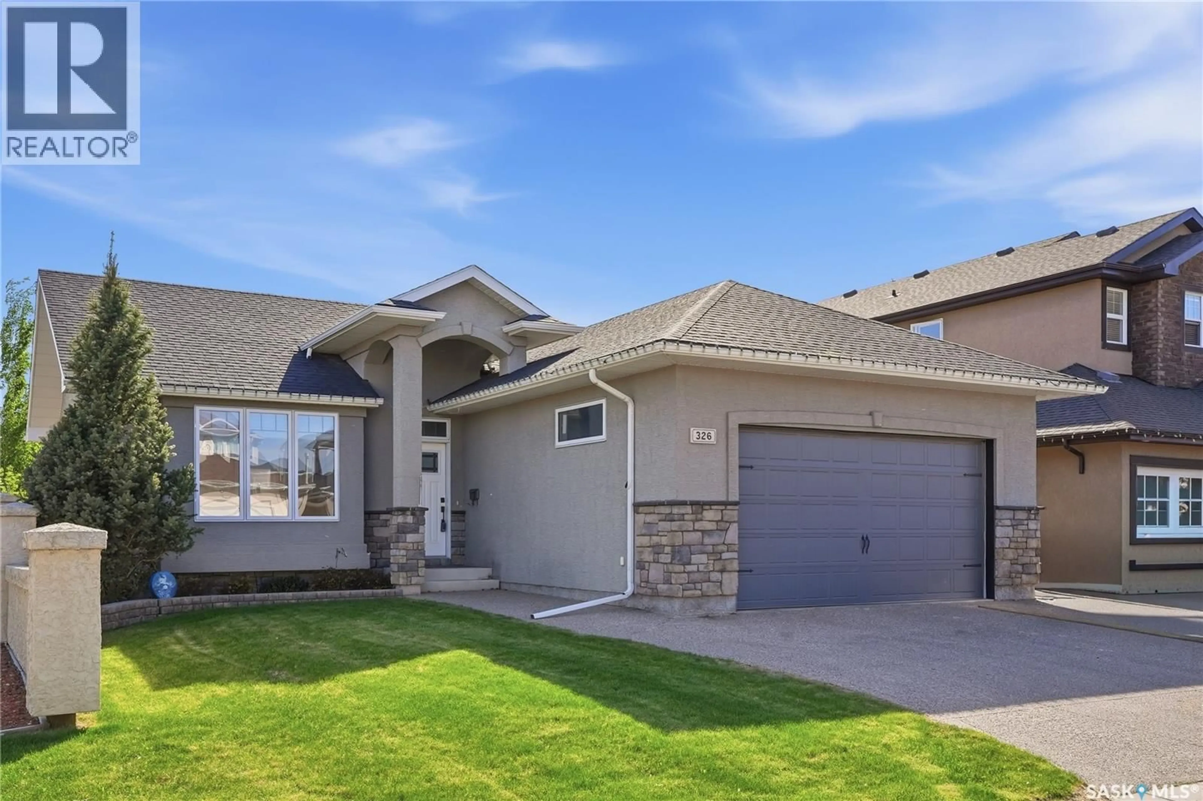 Home with vinyl exterior material, street for 326 HORLICK CRESCENT, Saskatoon Saskatchewan S7N4R5