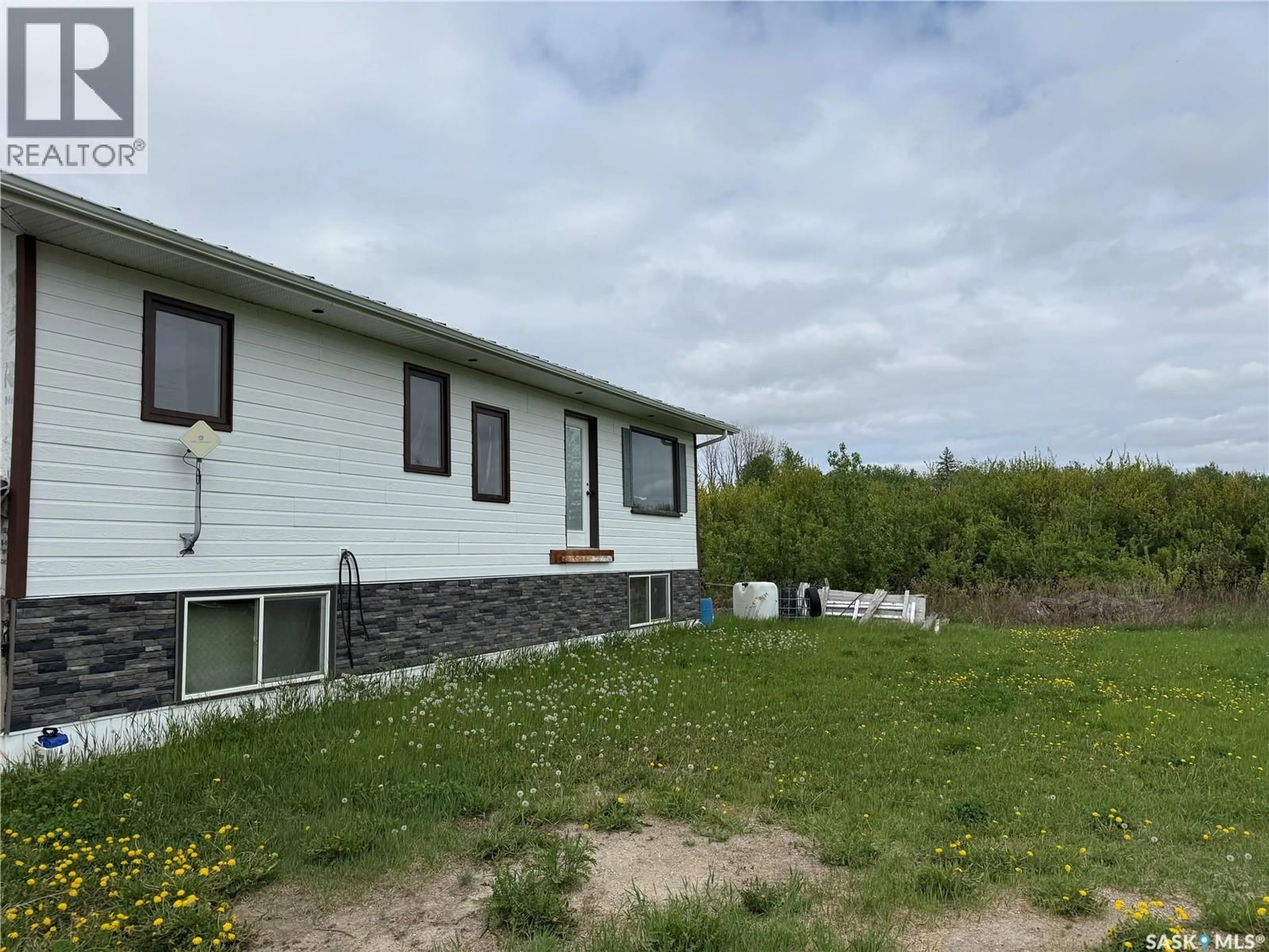 A pic from outside/outdoor area/front of a property/back of a property/a pic from drone, unknown for LAROSE ACREAGE, Torch River Rm No. 488 Saskatchewan S0J3B0