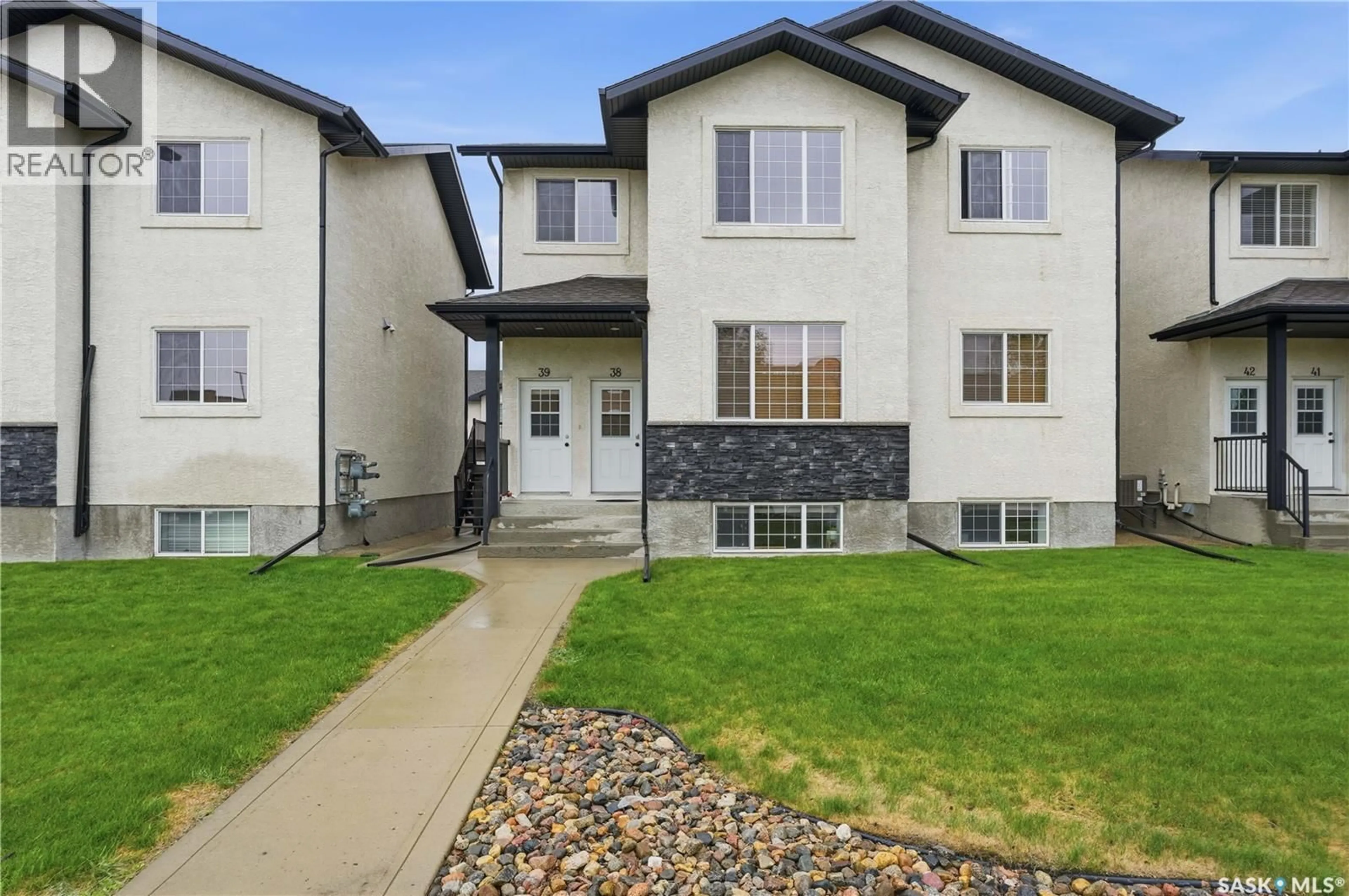Home with vinyl exterior material, street for 39 - 4640 HARBOUR LANDING DRIVE, Regina Saskatchewan S4W0B8