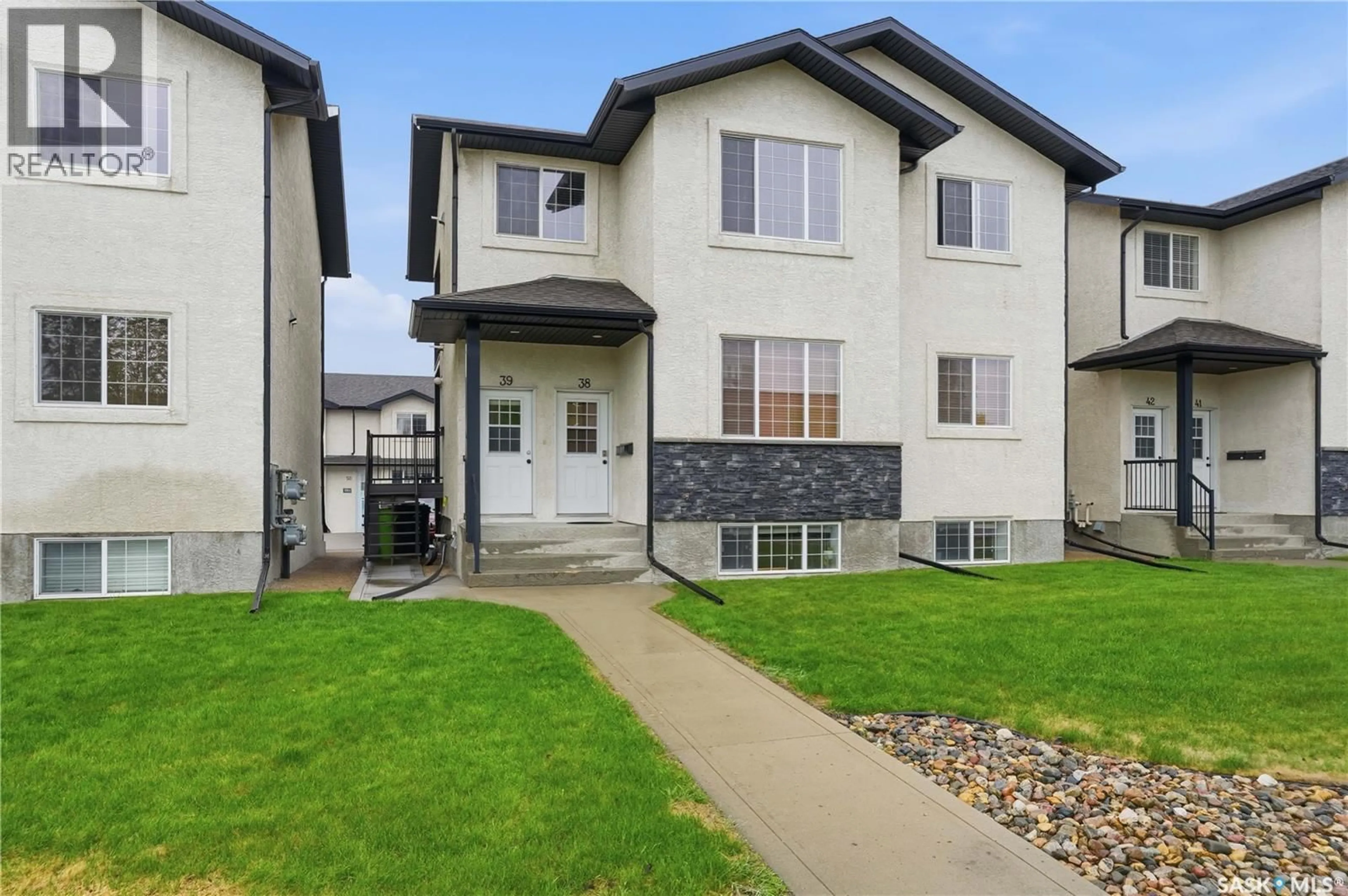 Home with vinyl exterior material, street for 39 - 4640 HARBOUR LANDING DRIVE, Regina Saskatchewan S4W0B8