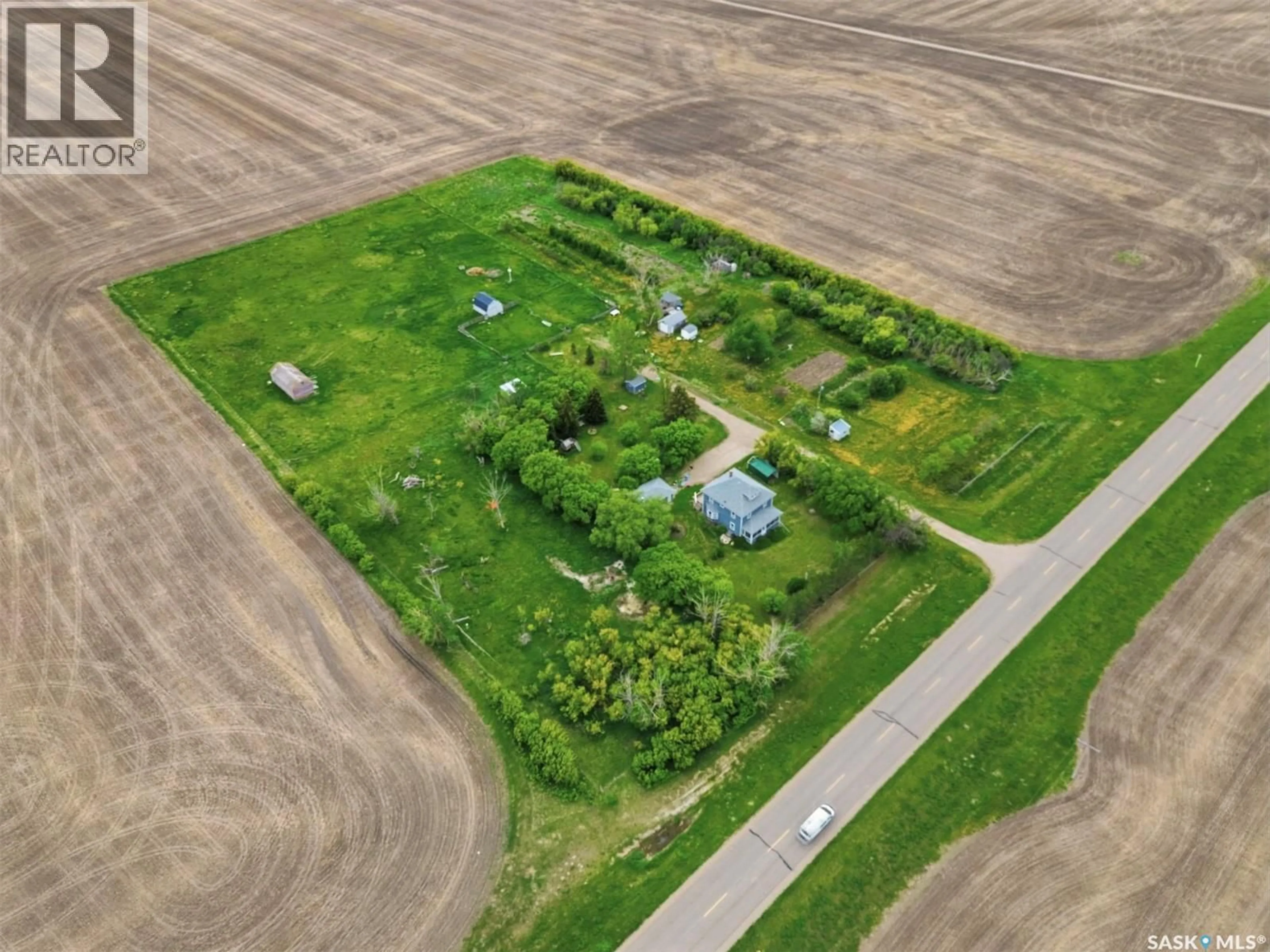 A pic from outside/outdoor area/front of a property/back of a property/a pic from drone, street for LAND OF THE LIVING SKIES ACREAGE, Davidson Saskatchewan S0G1A0