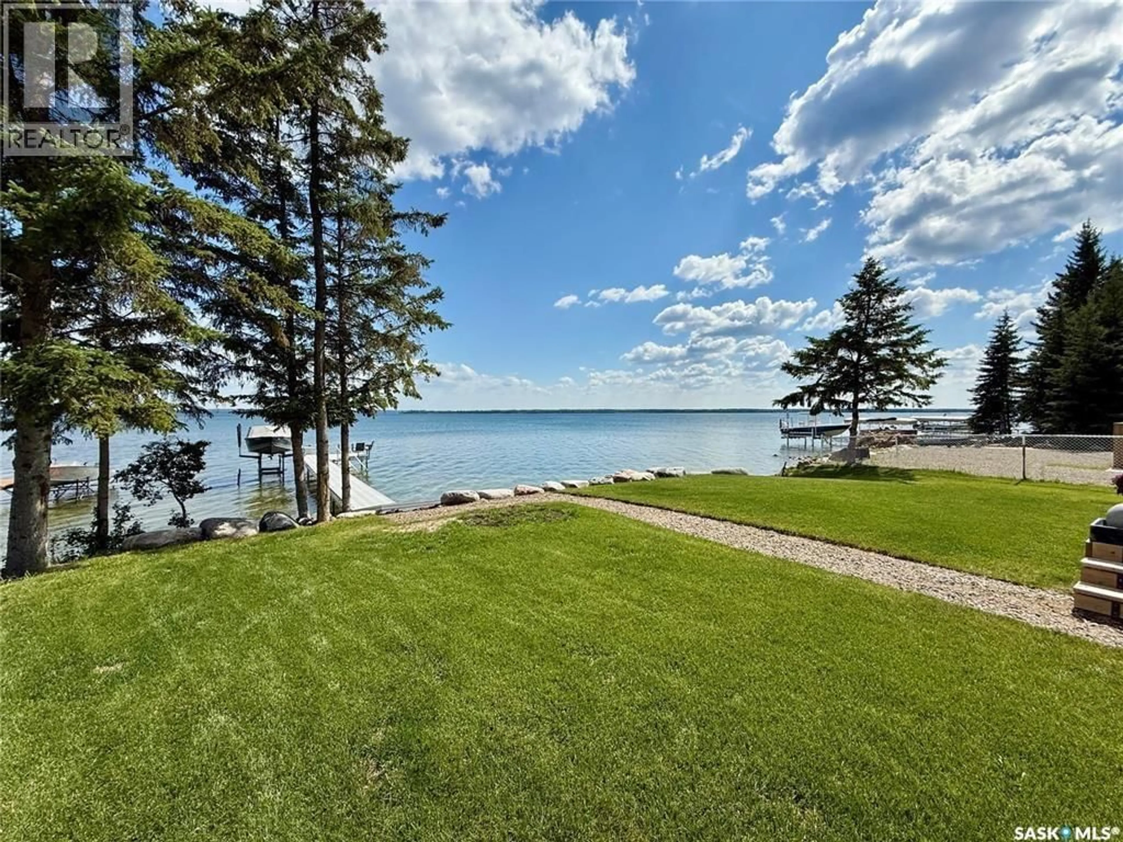 A pic from outside/outdoor area/front of a property/back of a property/a pic from drone, water/lake/river/ocean view for 22 LAKEVIEW DRIVE, Candle Lake Saskatchewan S0J3E0