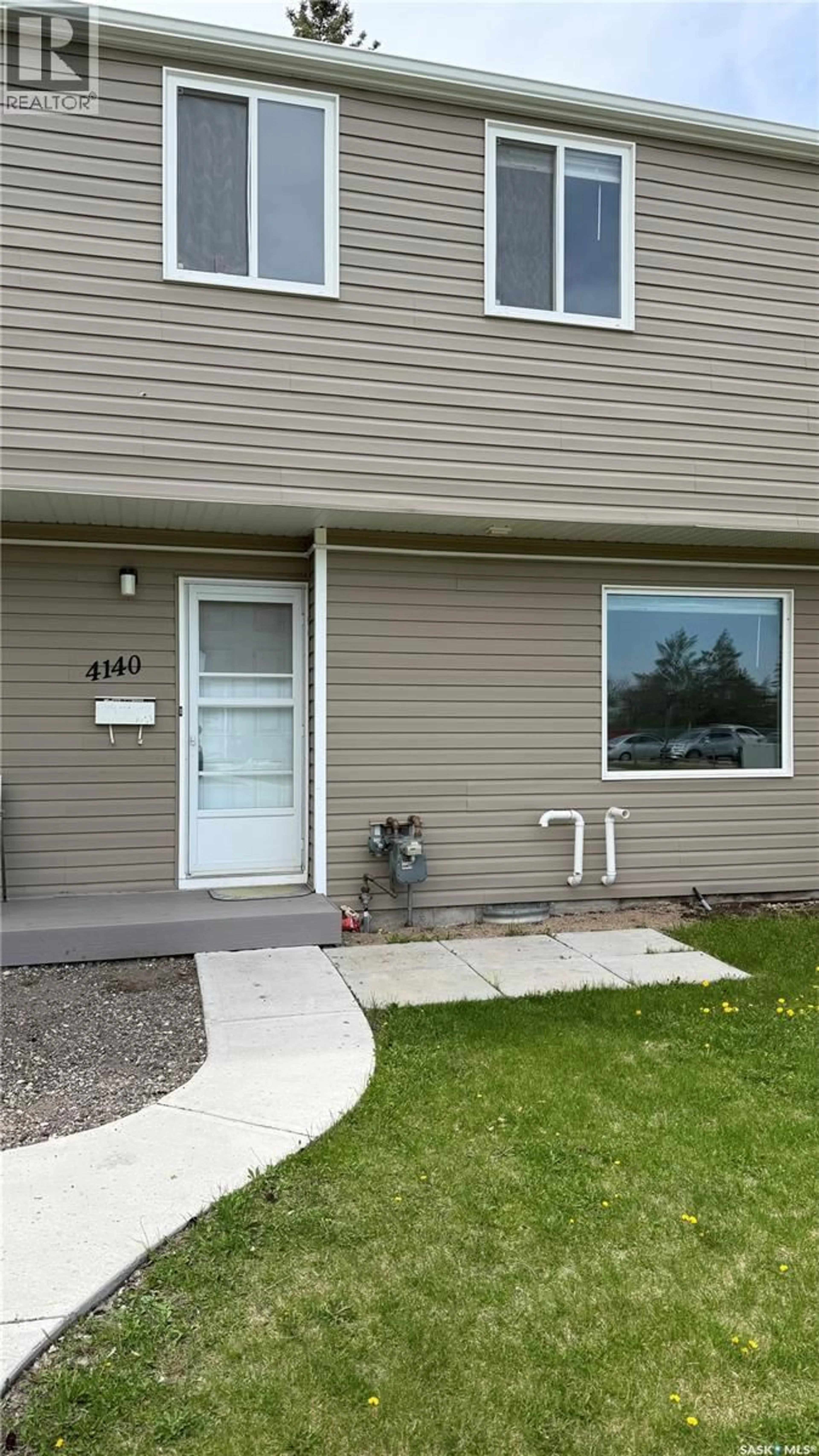 Home with vinyl exterior material, street for 4140 CASTLE ROAD, Regina Saskatchewan S4S6A4