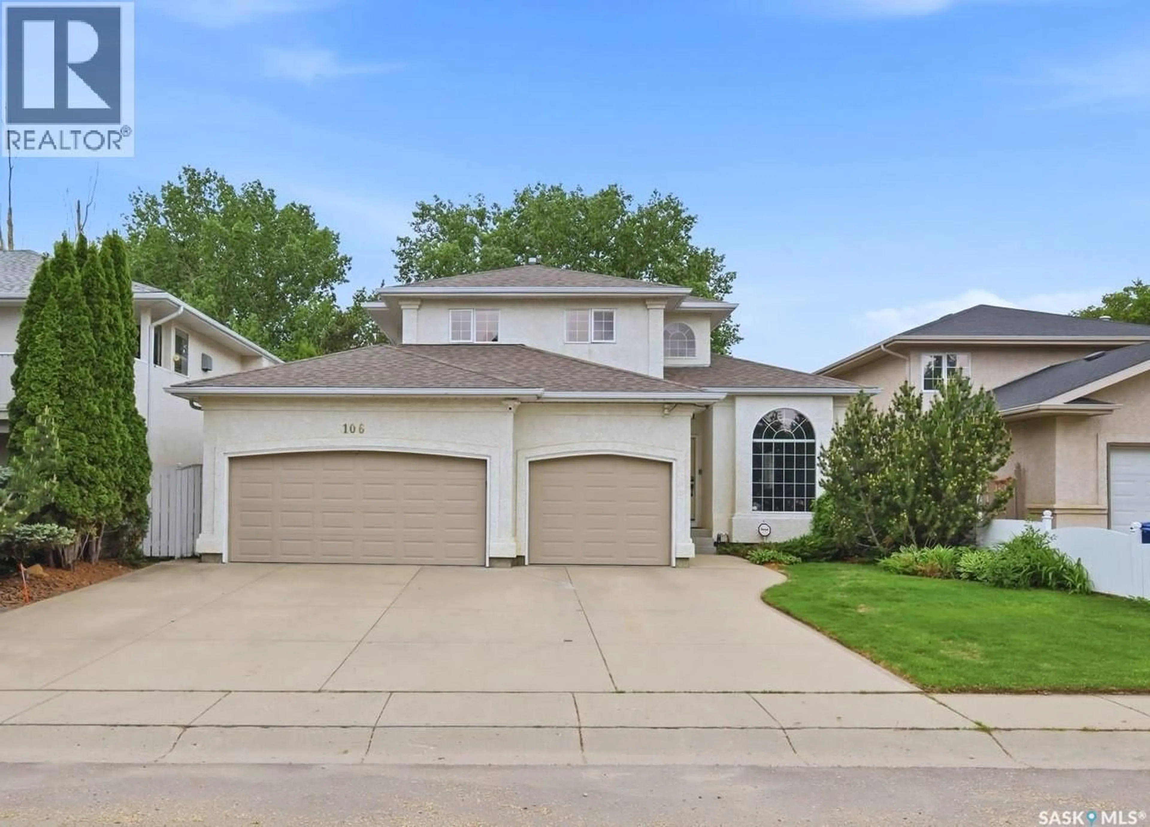 Home with vinyl exterior material, street for 106 MENDEL CRESCENT, Saskatoon Saskatchewan S7J5J7