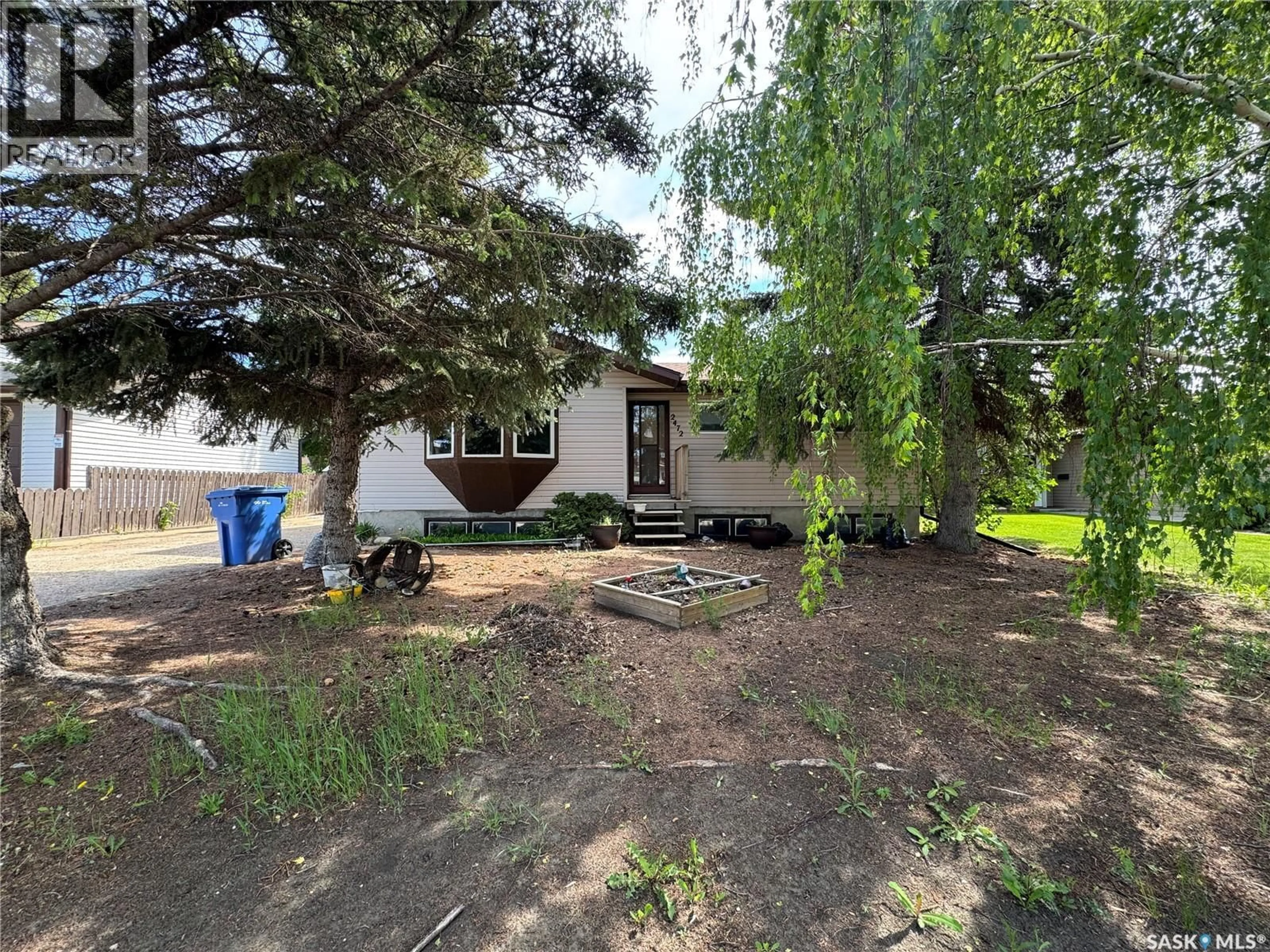 A pic from outside/outdoor area/front of a property/back of a property/a pic from drone, street for 2472 ROSS CRESCENT, North Battleford Saskatchewan S9A3R3