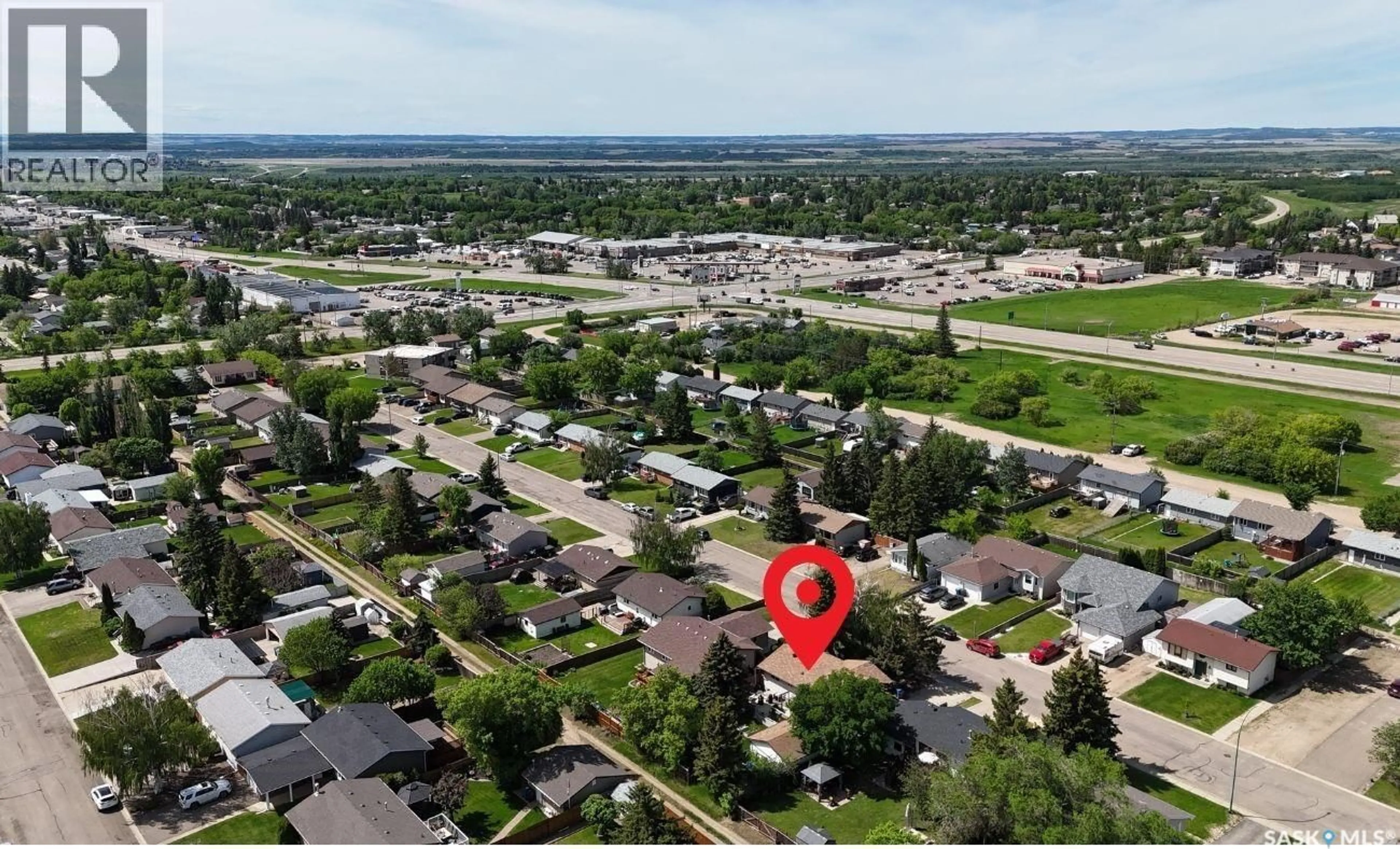 A pic from outside/outdoor area/front of a property/back of a property/a pic from drone, unknown for 2472 ROSS CRESCENT, North Battleford Saskatchewan S9A3R3