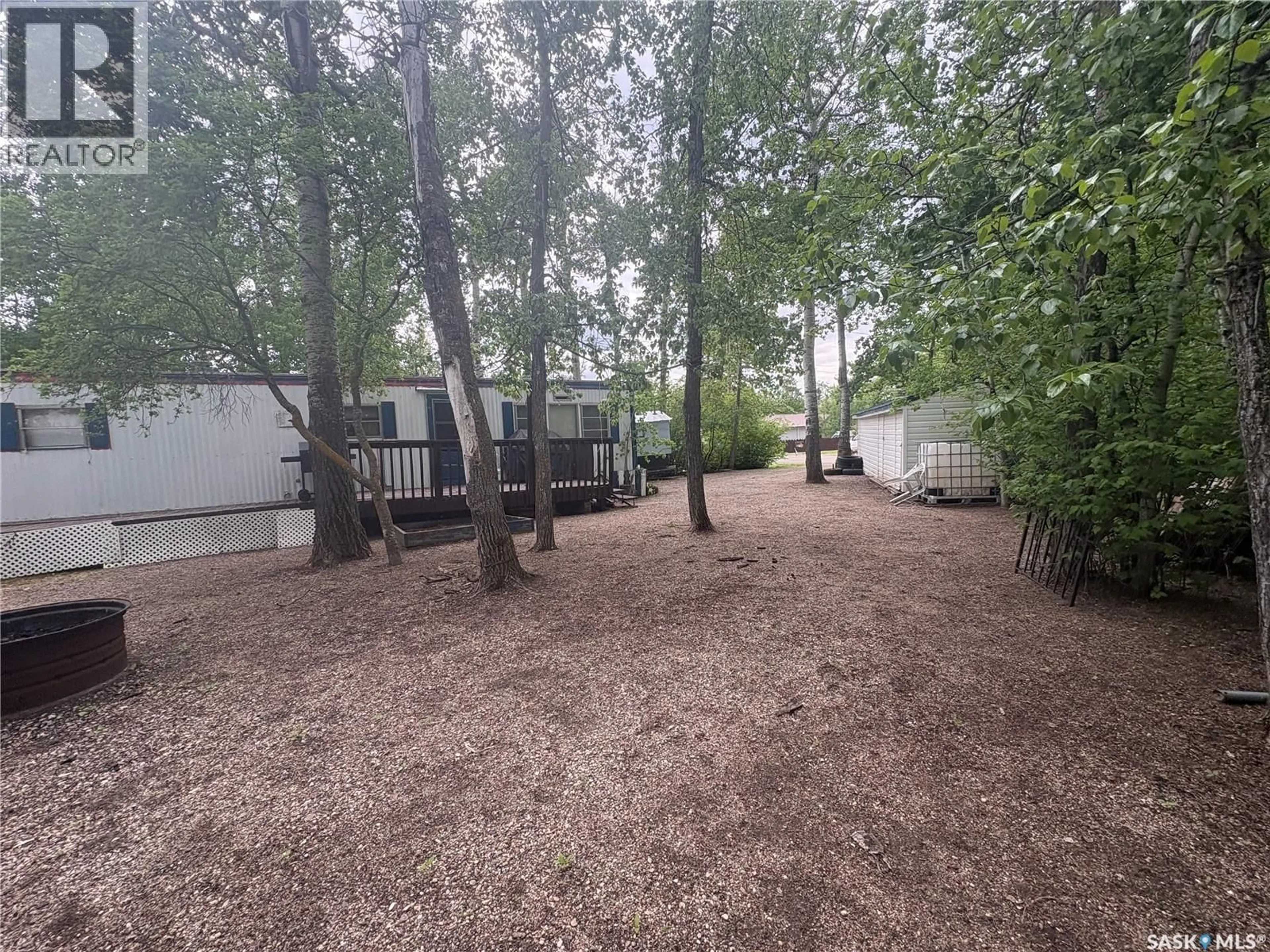 A pic from outside/outdoor area/front of a property/back of a property/a pic from drone, forest/trees view for 8 HUNTER BAY, Fishing Lake Saskatchewan S0A4J0