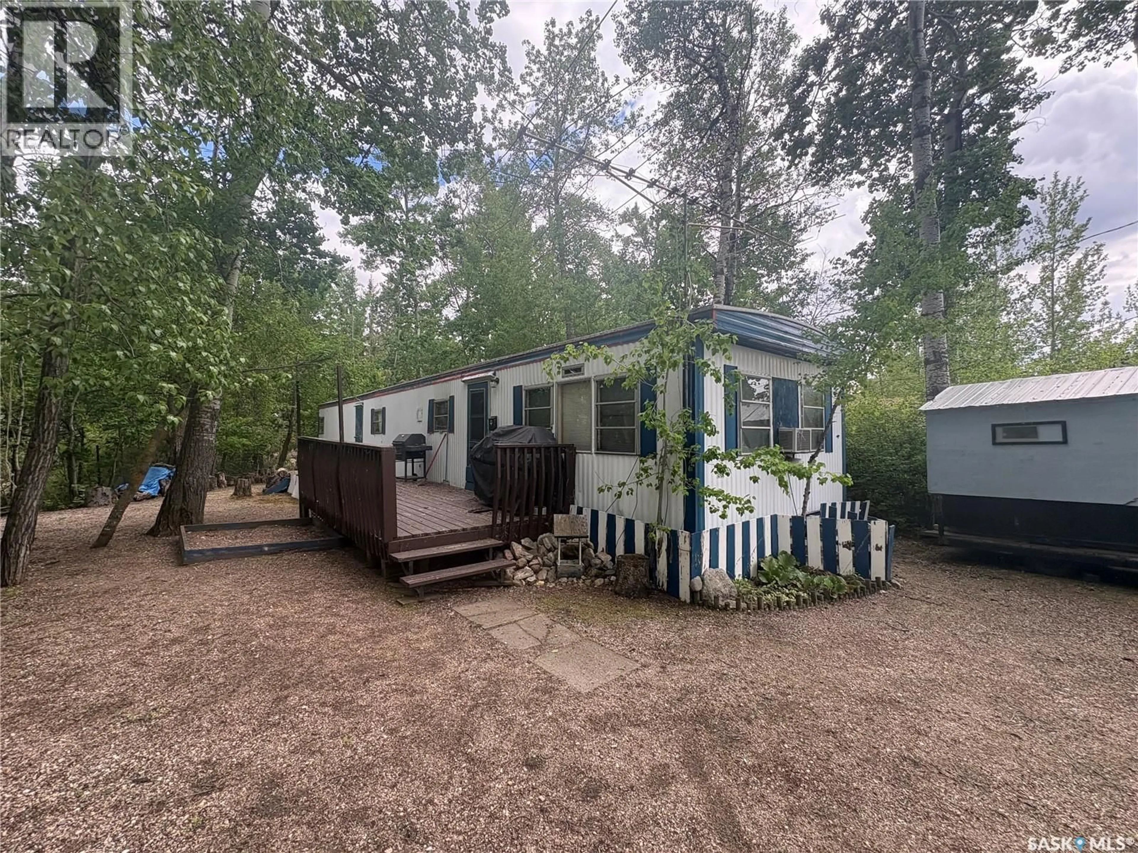 A pic from outside/outdoor area/front of a property/back of a property/a pic from drone, forest/trees view for 8 HUNTER BAY, Fishing Lake Saskatchewan S0A4J0