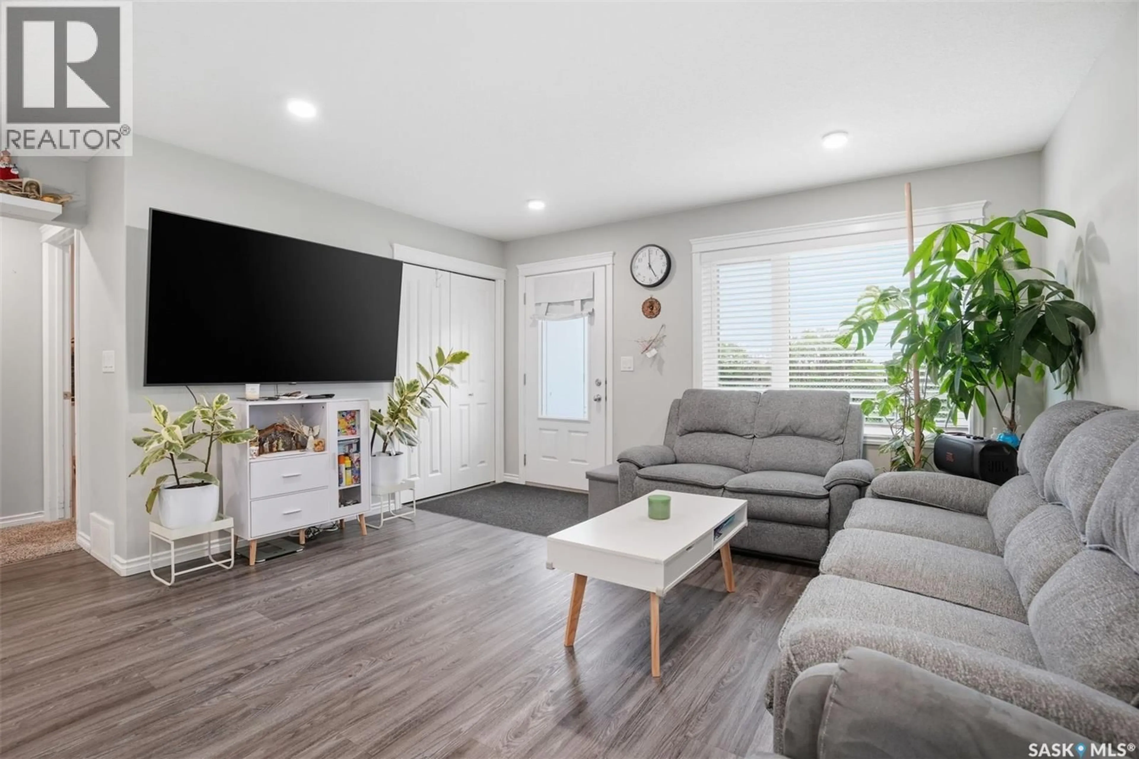 Living room with furniture, unknown for 306 - 110 AKHTAR BEND, Saskatoon Saskatchewan S7W0Y9