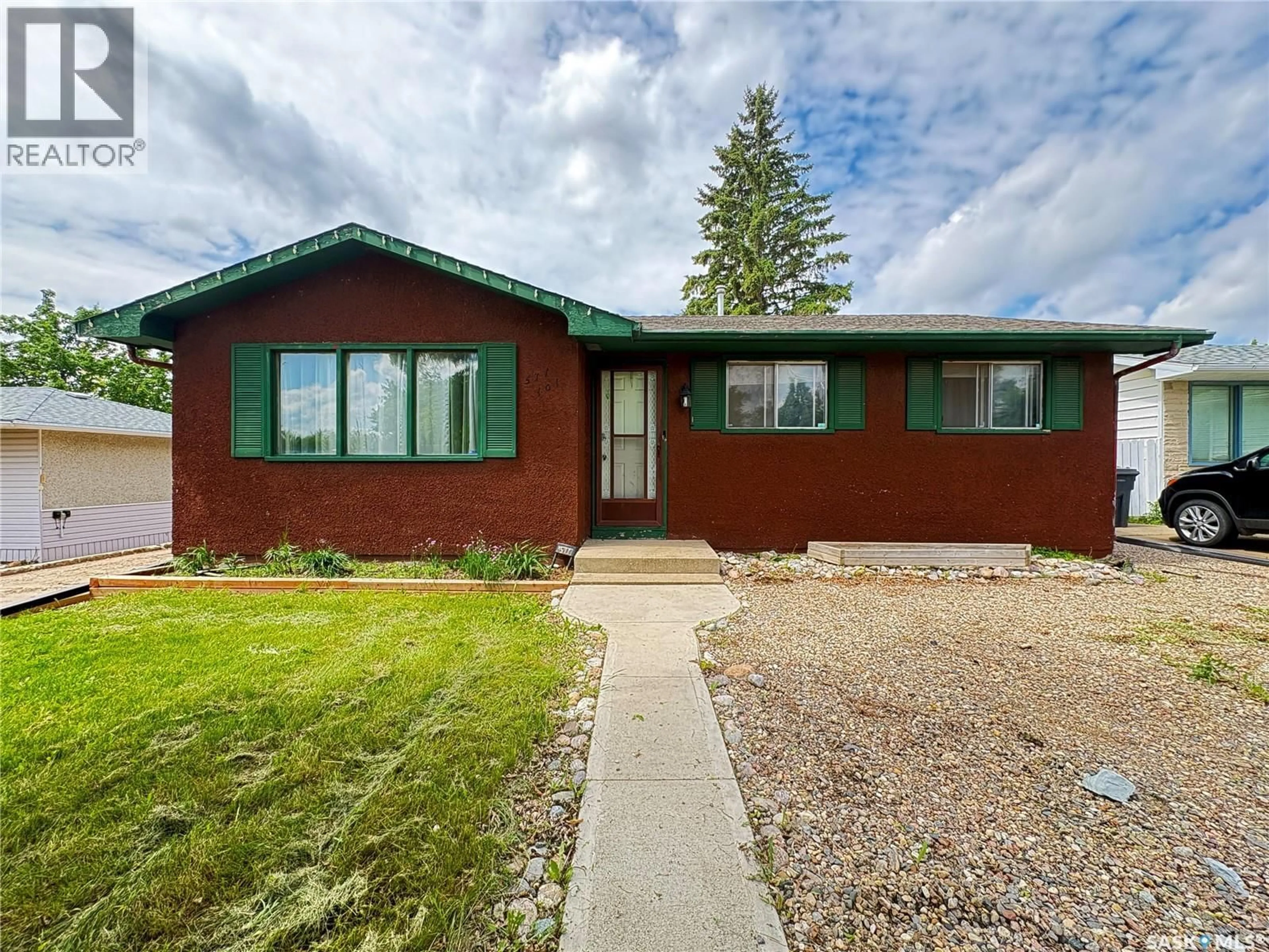 Home with vinyl exterior material, street for 571 101ST STREET, North Battleford Saskatchewan S9A0Y5