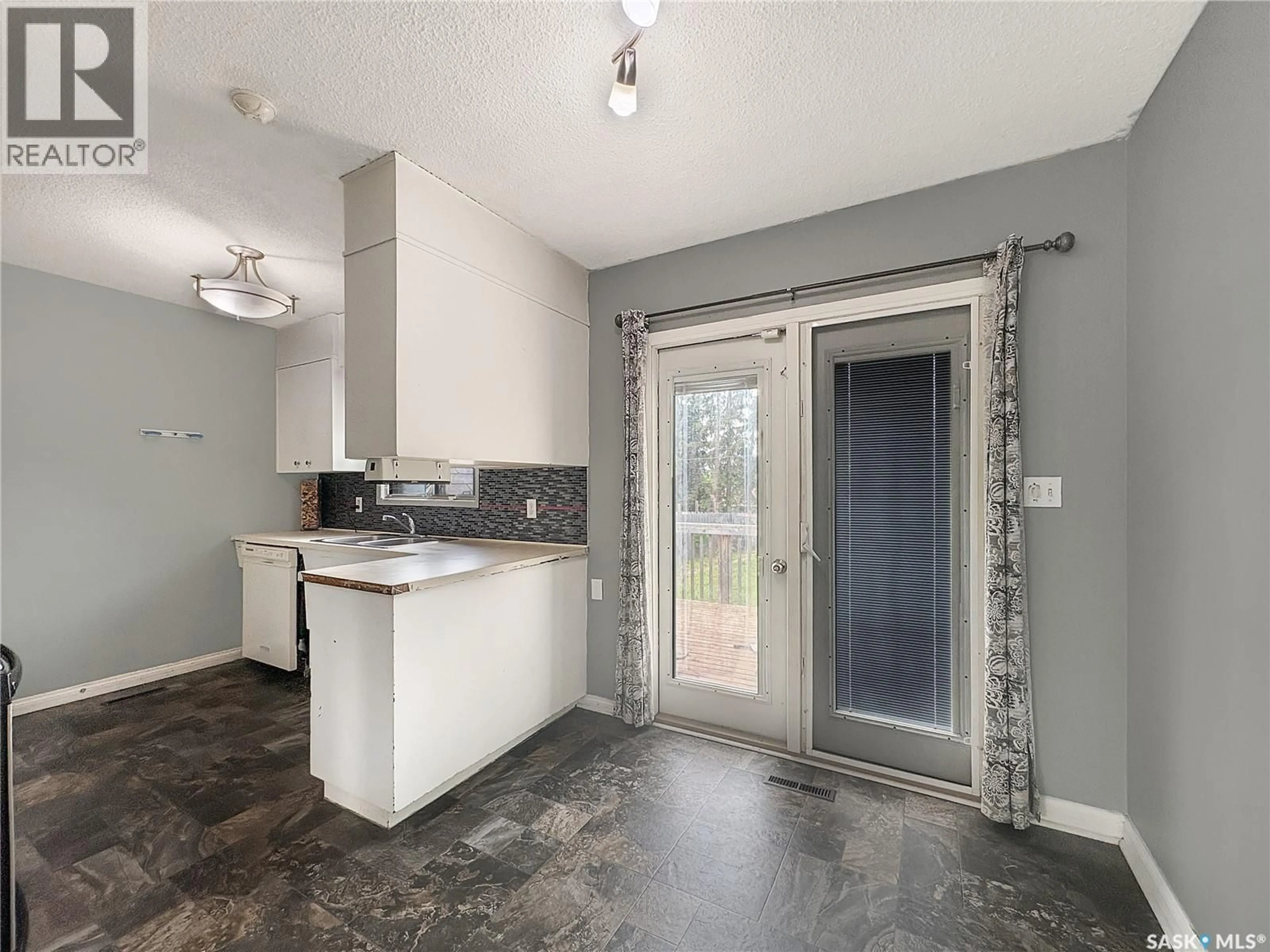 Open concept kitchen, unknown for 571 101ST STREET, North Battleford Saskatchewan S9A0Y5