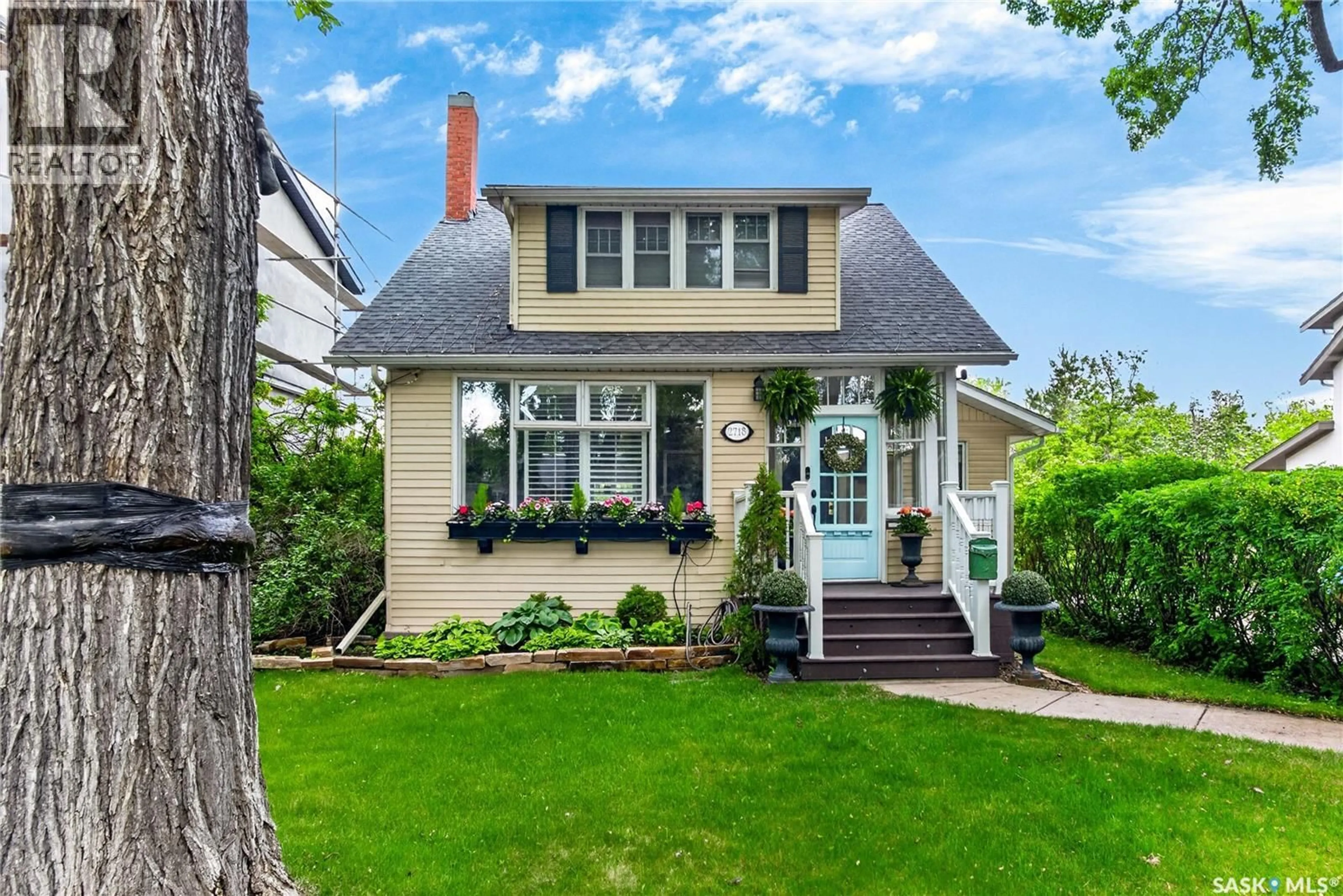 Home with vinyl exterior material, street for 2718 REGINA AVENUE, Regina Saskatchewan S4S0G5