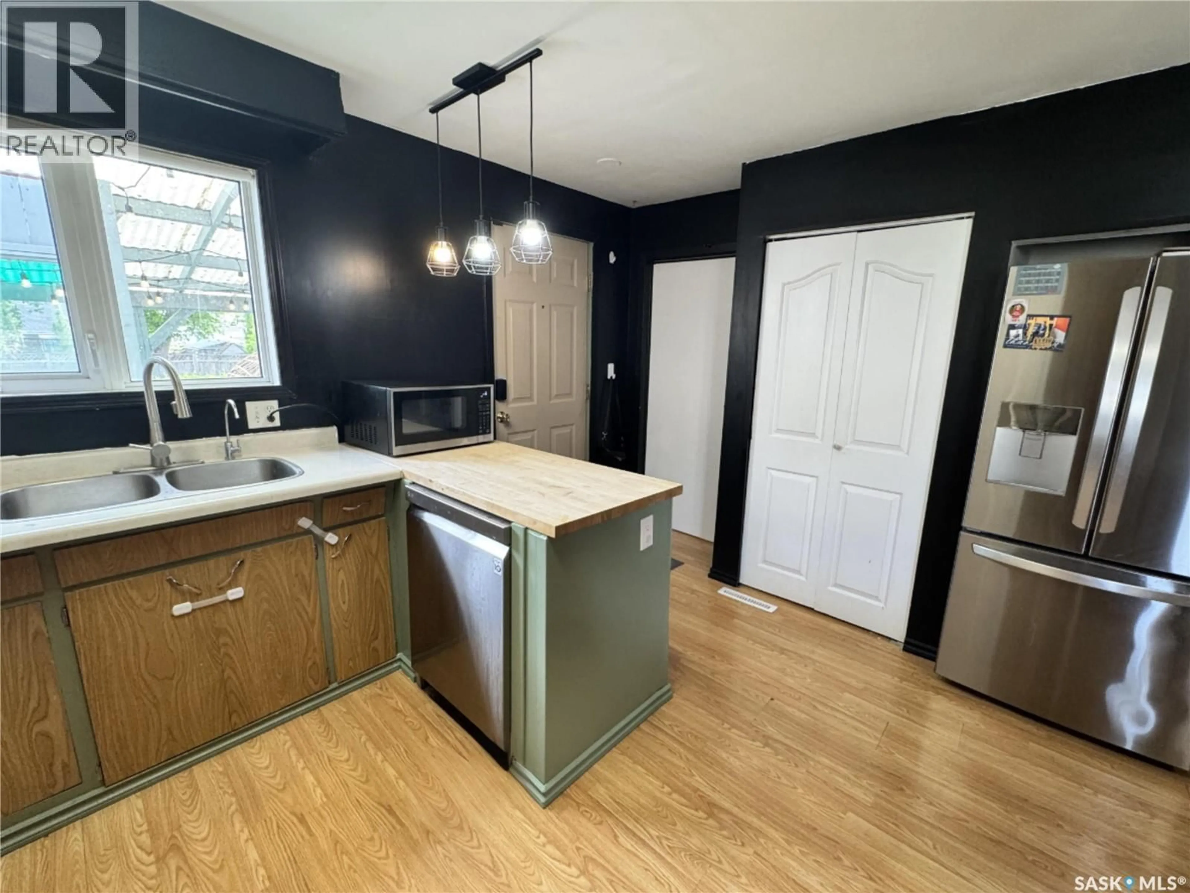 Open concept kitchen, unknown for 308 7TH AVENUE, Biggar Saskatchewan S0K0M0