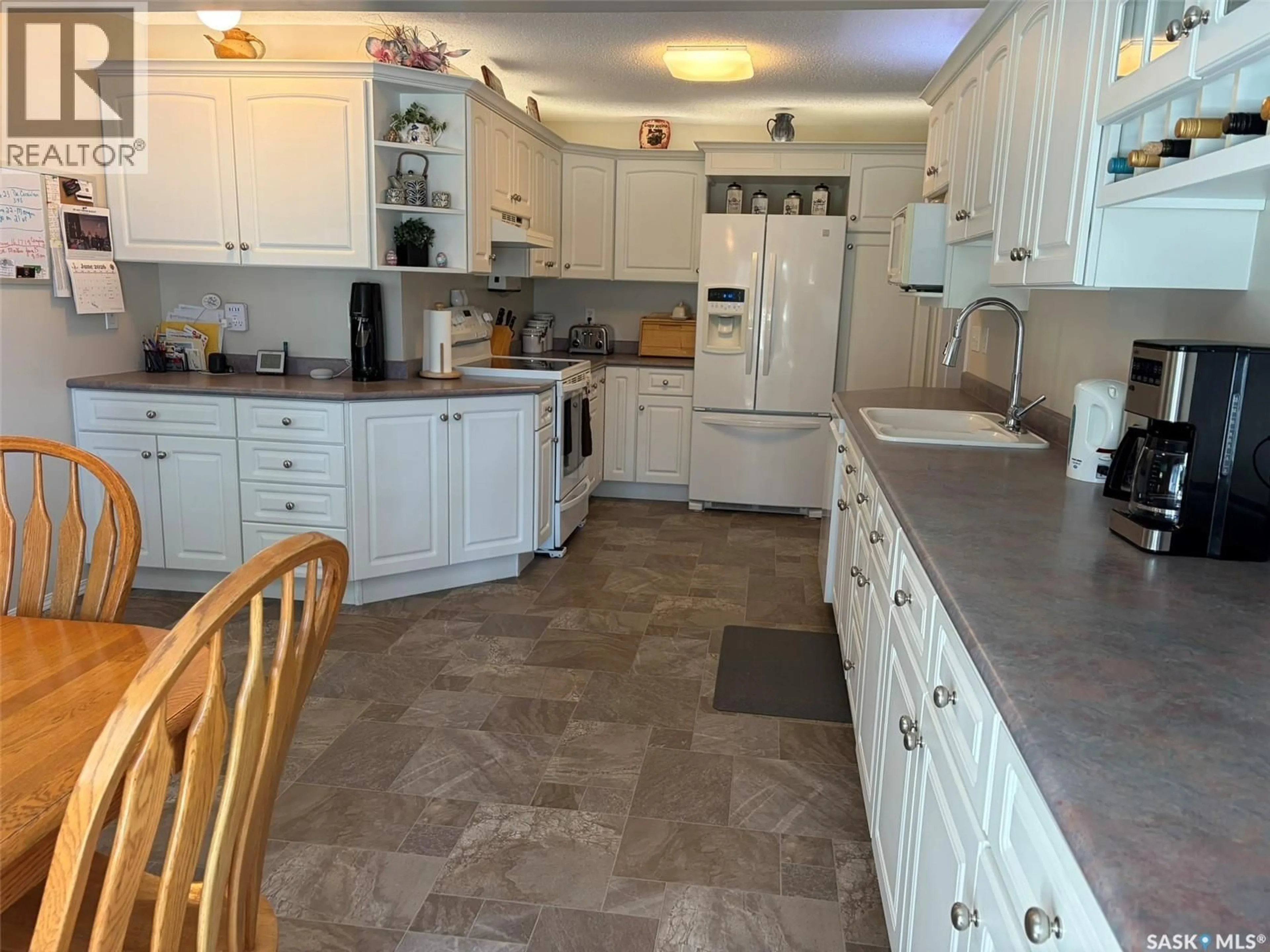 Open concept kitchen, ceramic/tile floor for 310 34TH STREET, Prince Albert Saskatchewan S6V8B8