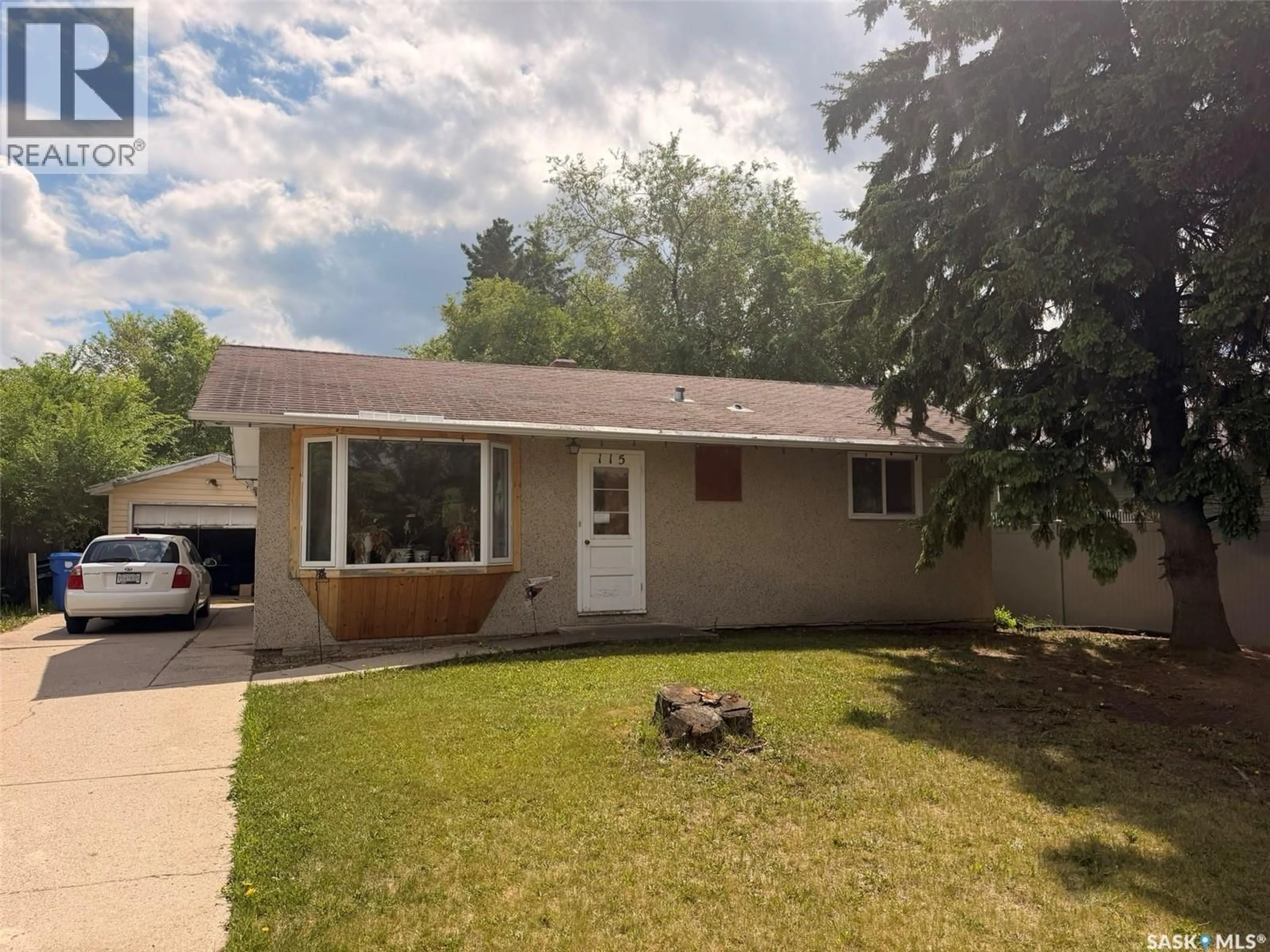 Home with vinyl exterior material, street for 115 SOUTH AVENUE W, Hafford Saskatchewan S0J1A0