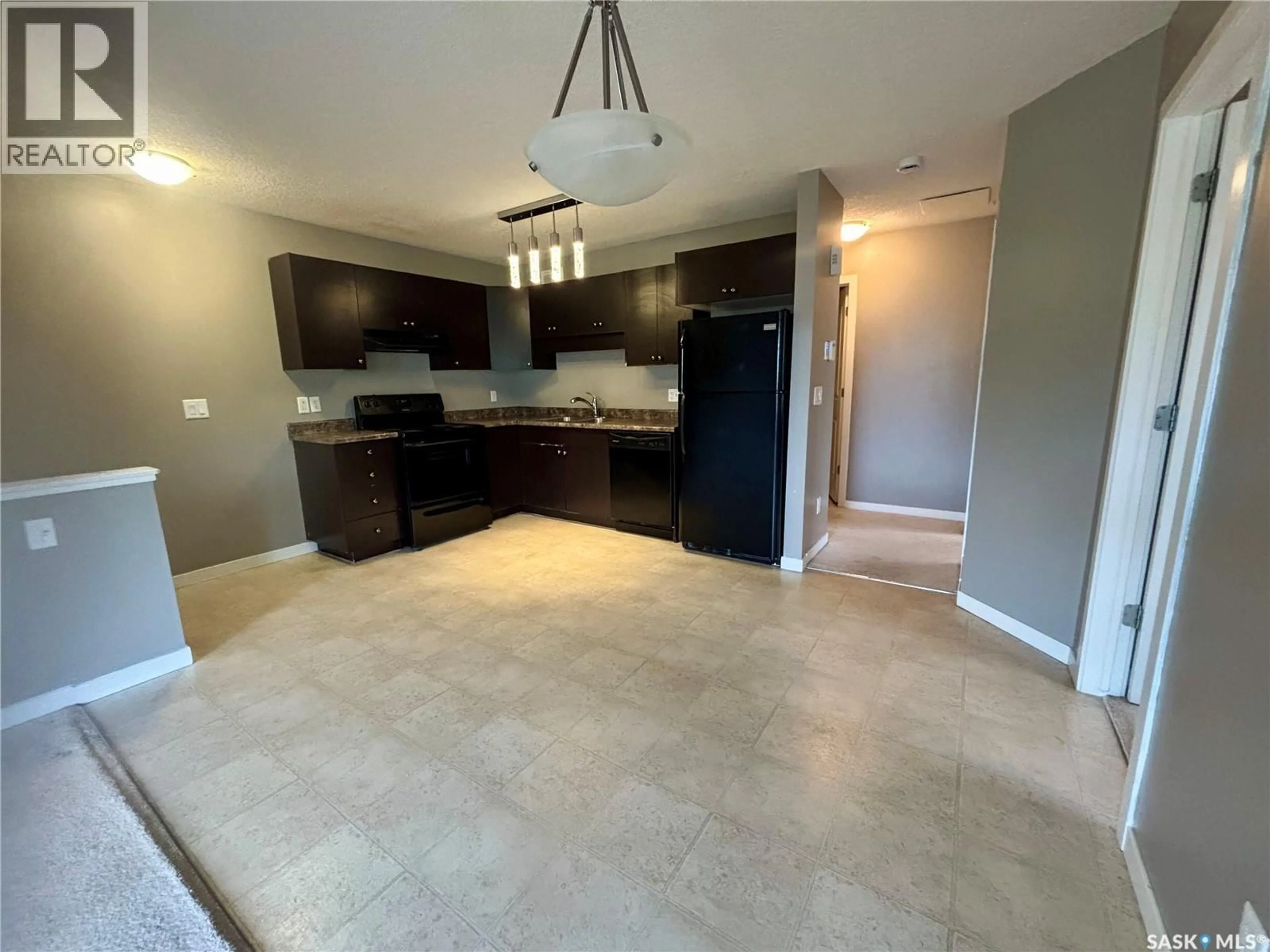 Open concept kitchen, ceramic/tile floor for 82 - 5533 BLAKE CRESCENT, Regina Saskatchewan S4X0J1