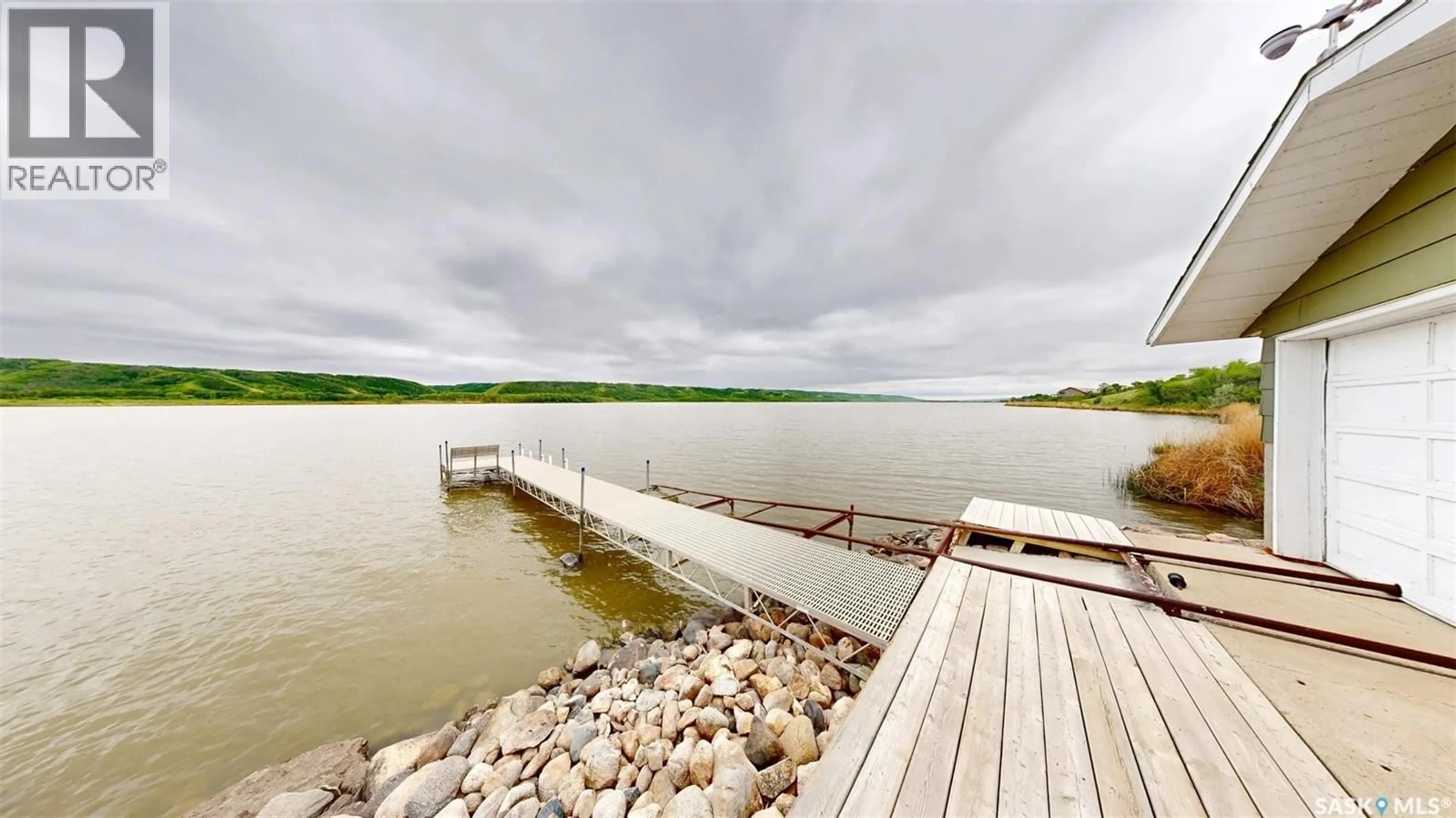 Patio, water/lake/river/ocean view for 728 ELM STREET, Pasqua Lake Saskatchewan S0G1S0