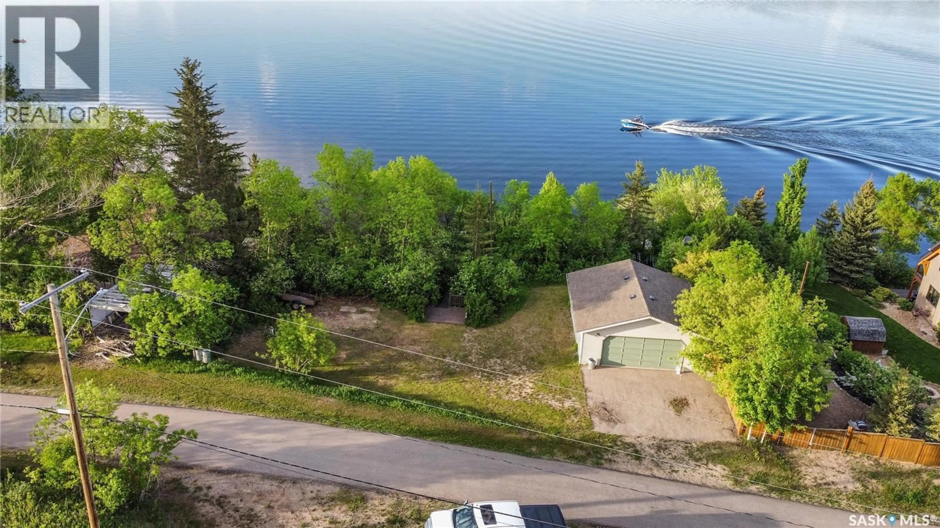 A pic from outside/outdoor area/front of a property/back of a property/a pic from drone, water/lake/river/ocean view for 215-216 OSMENT AVENUE, Katepwa Beach Saskatchewan S0G2Y0