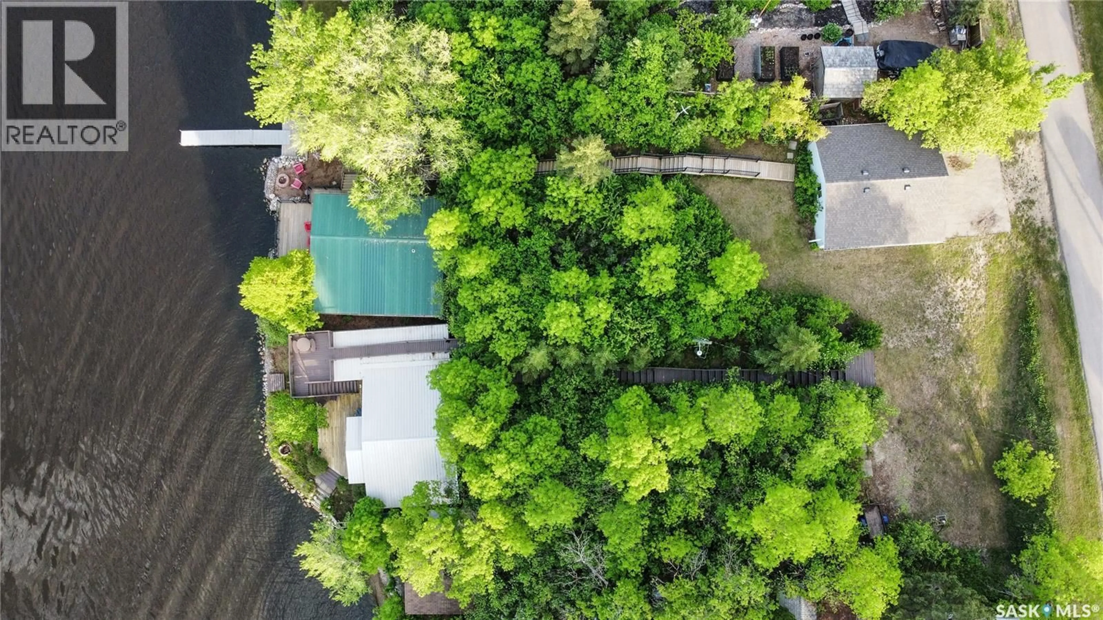 A pic from outside/outdoor area/front of a property/back of a property/a pic from drone, unknown for 215-216 OSMENT AVENUE, Katepwa Beach Saskatchewan S0G2Y0