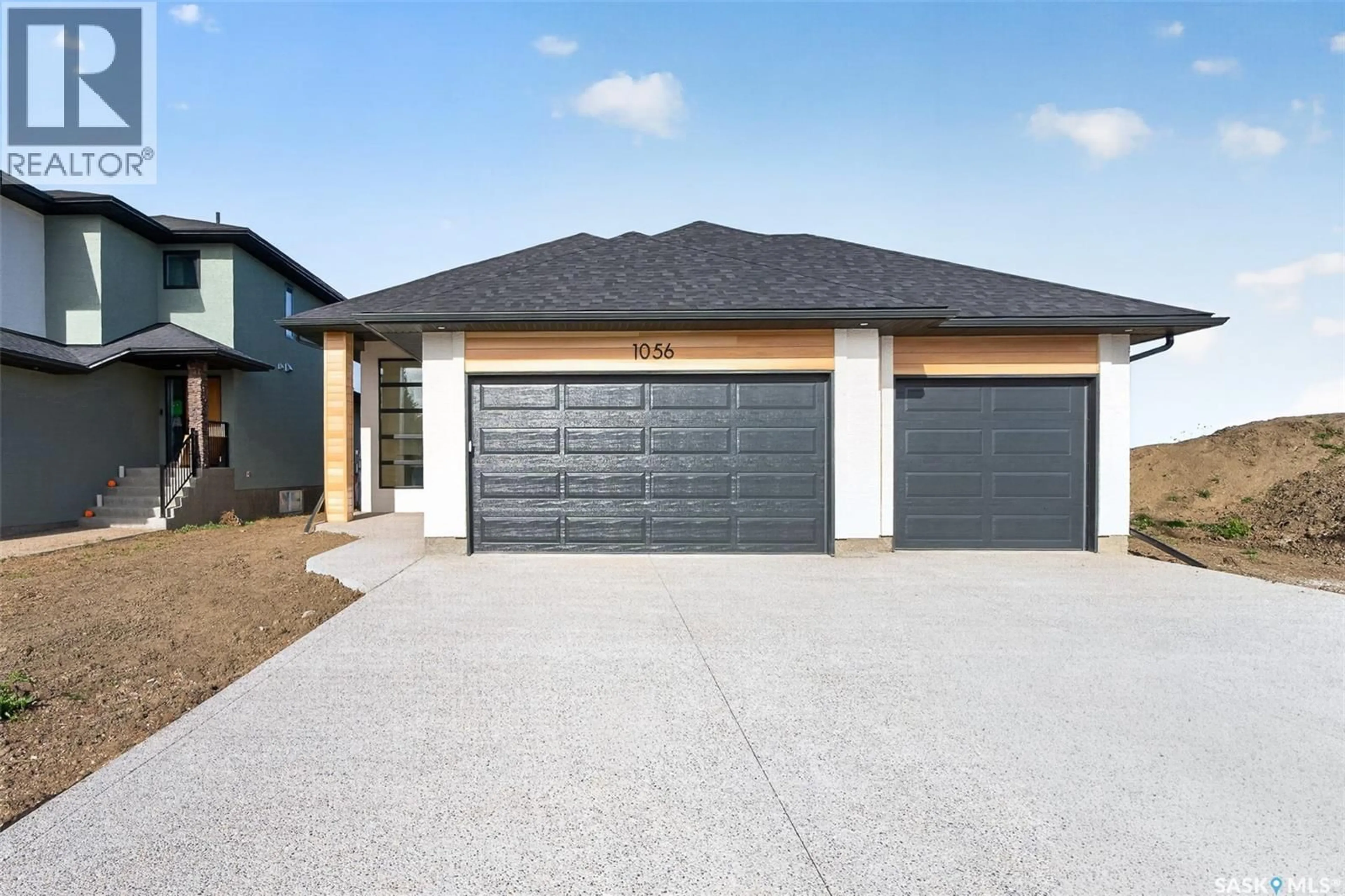 Home with brick exterior material, street for 1056 WEST PARK BOULEVARD, Moose Jaw Saskatchewan S6J0E6