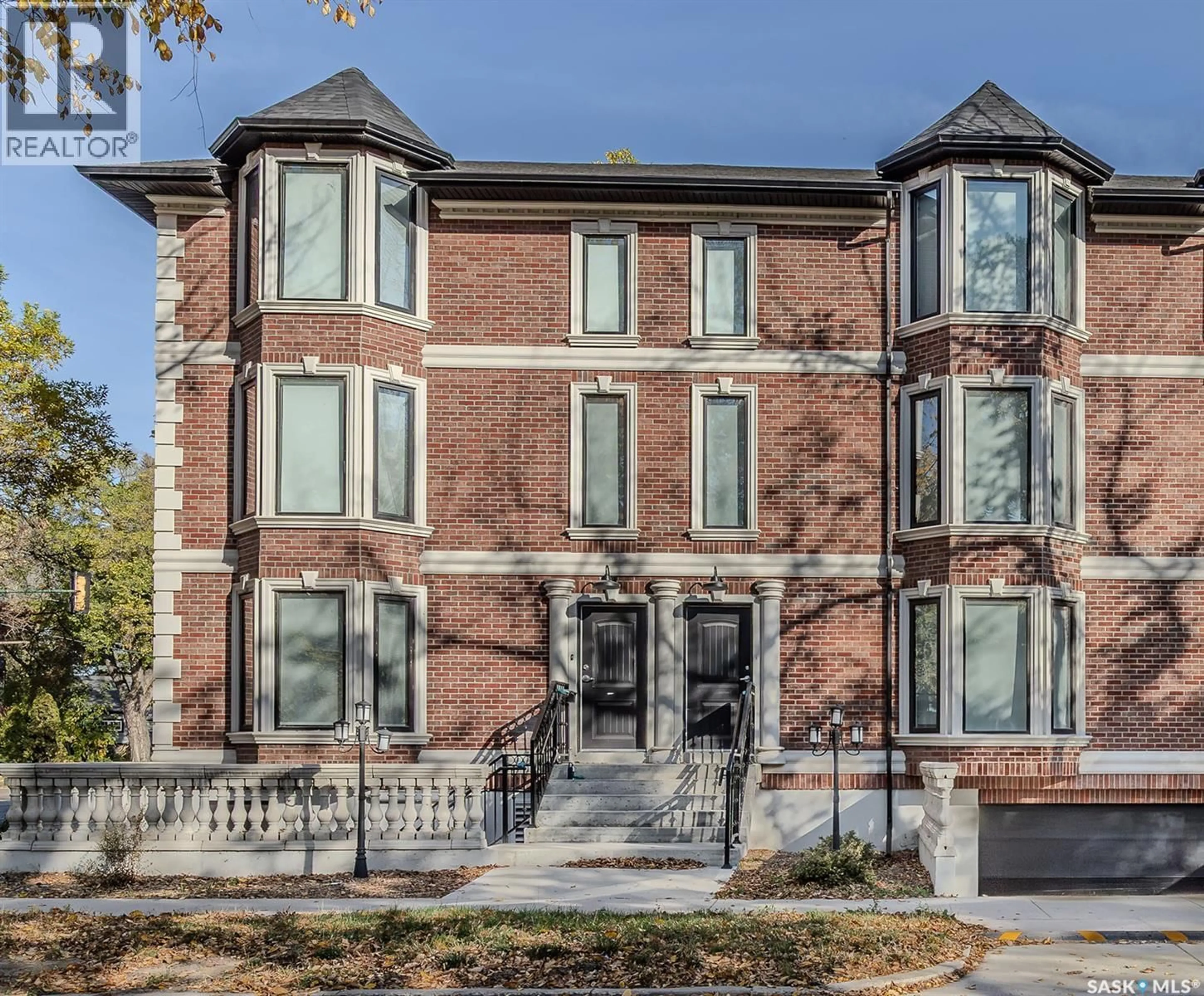 Home with brick exterior material, street for 1001 OSLER STREET, Saskatoon Saskatchewan S7N0T5