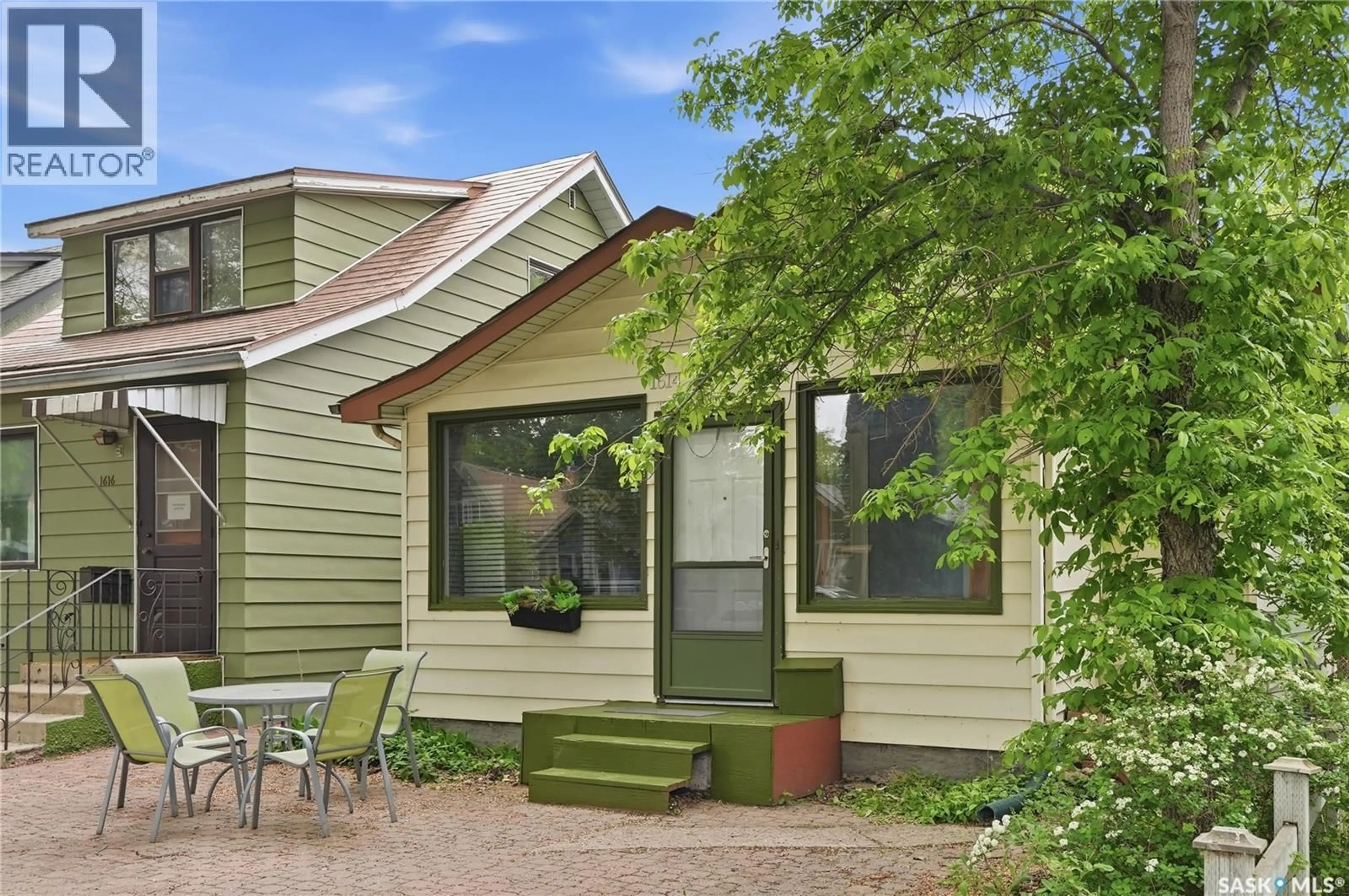 Home with vinyl exterior material, street for 1614 LORNE AVENUE, Saskatoon Saskatchewan S7H1Y1