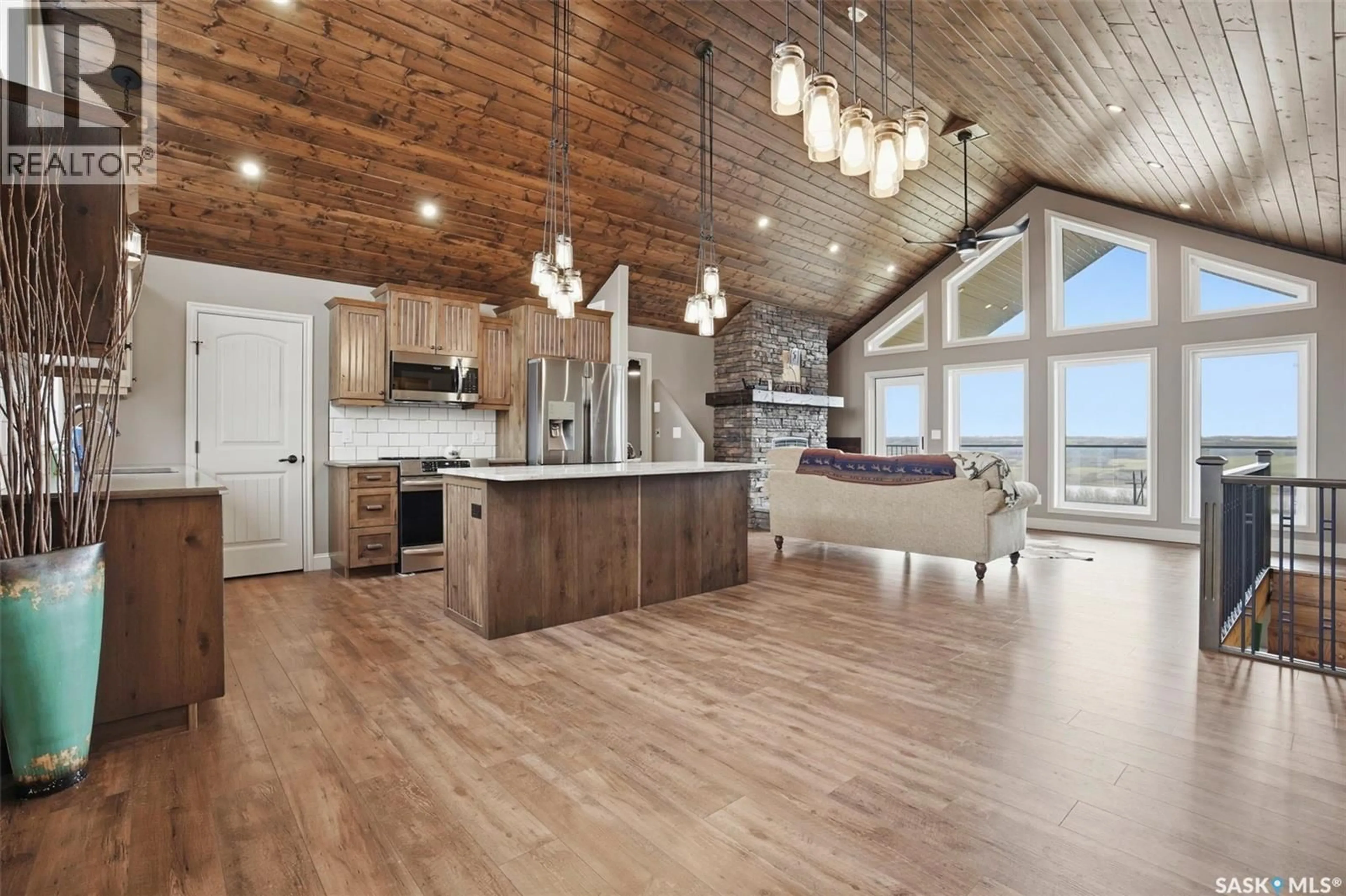 Open concept kitchen, wood/laminate floor for MOEN ACREAGE, Blaine Lake Rm No. 434 Saskatchewan S0J0J0