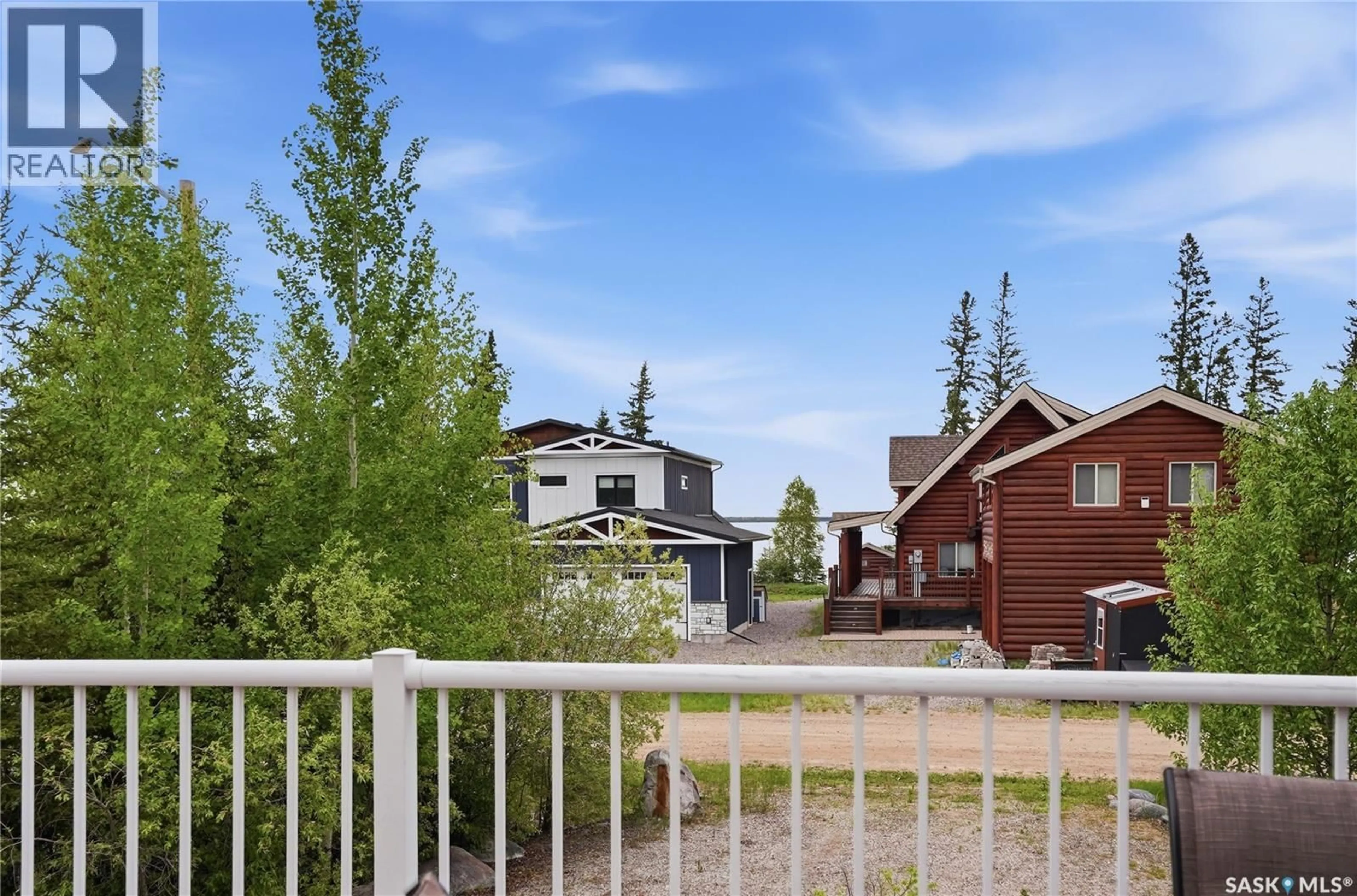 A pic from outside/outdoor area/front of a property/back of a property/a pic from drone, mountain view for 10 ISLANDER DRIVE, Candle Lake Saskatchewan S0J3E0