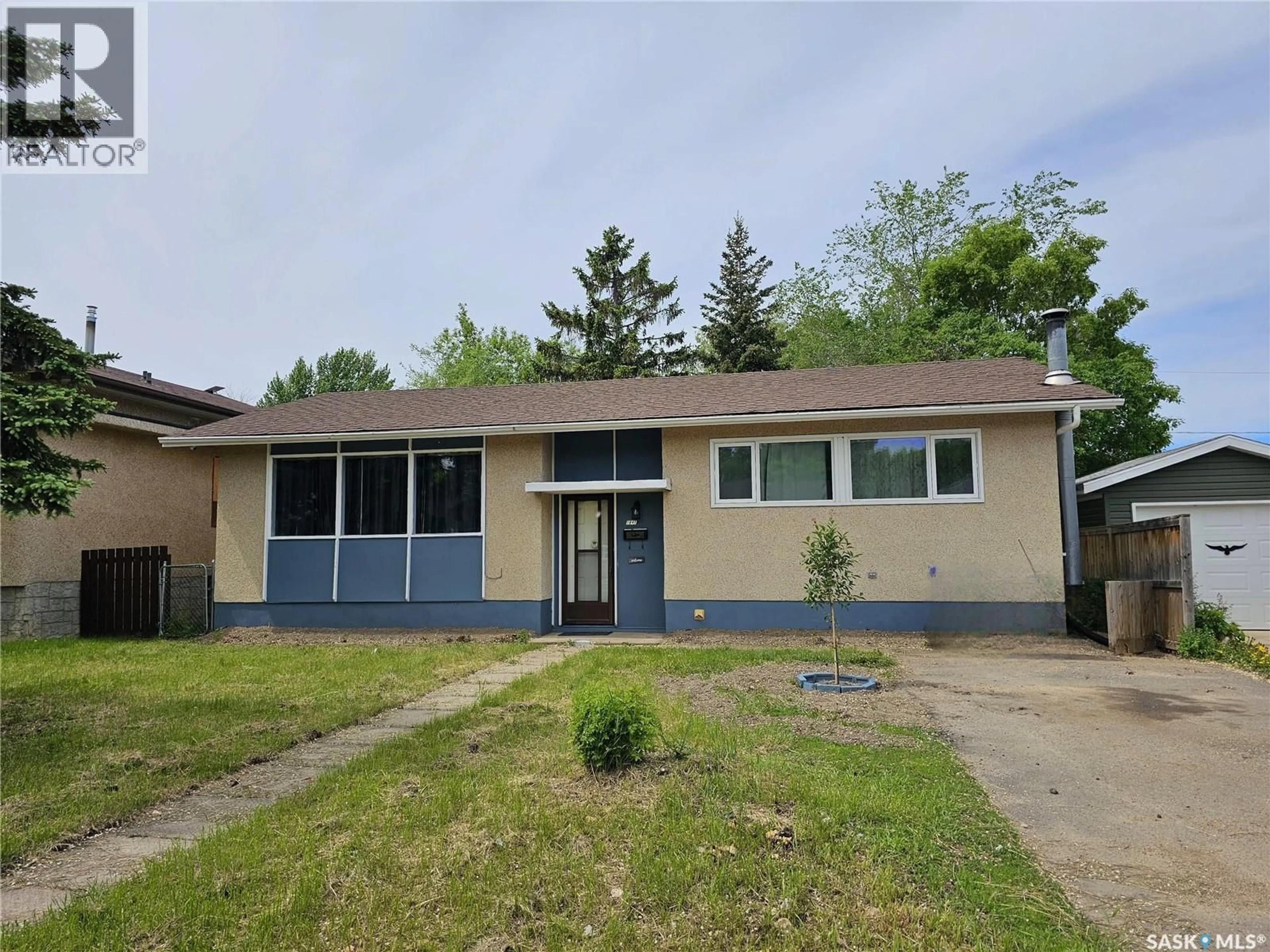 Home with vinyl exterior material, street for 1641 103RD STREET, North Battleford Saskatchewan S9A1L6