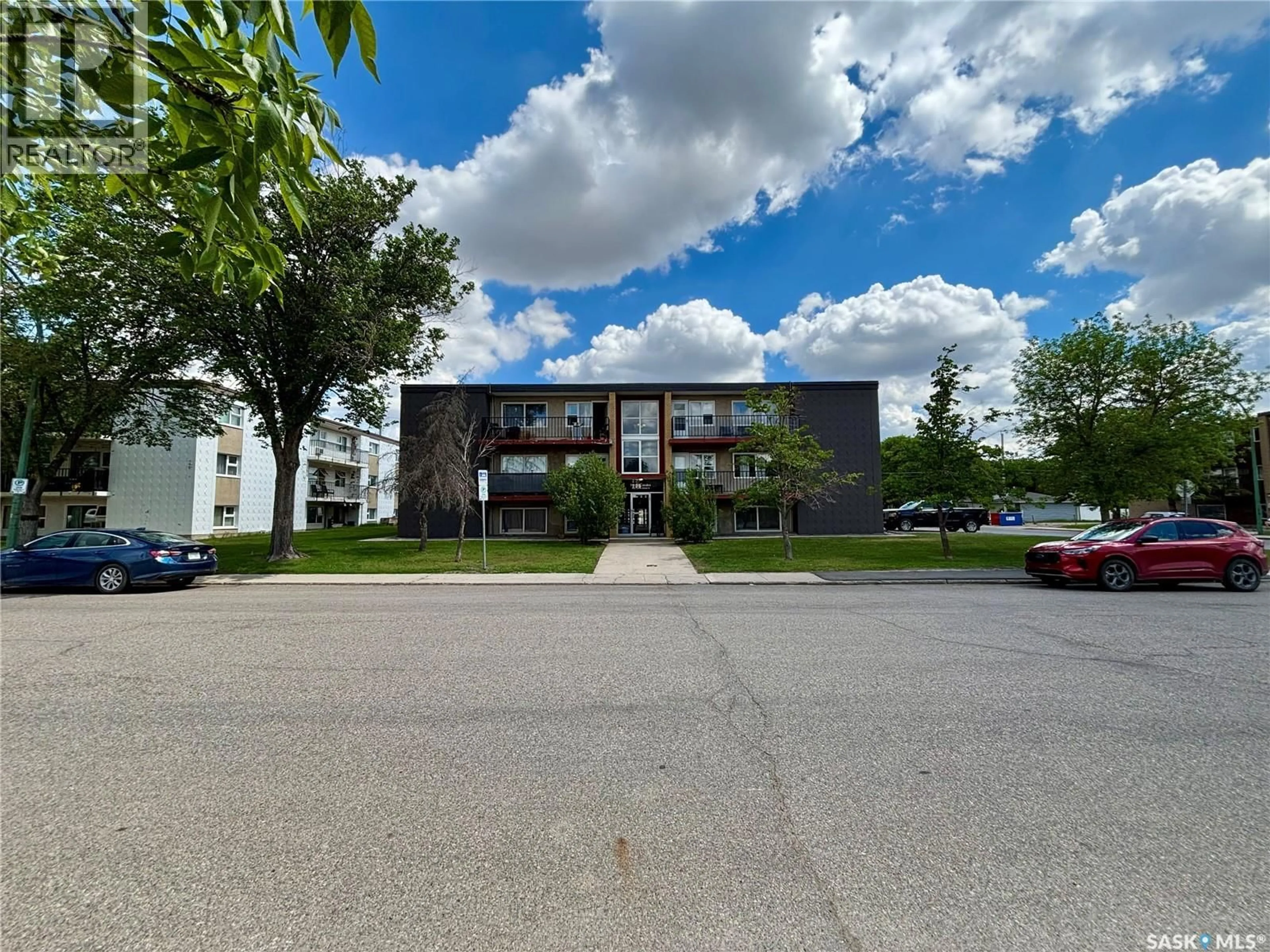 A pic from outside/outdoor area/front of a property/back of a property/a pic from drone, street for 12 405 LORNE STREET N, Regina Saskatchewan S4R3B2