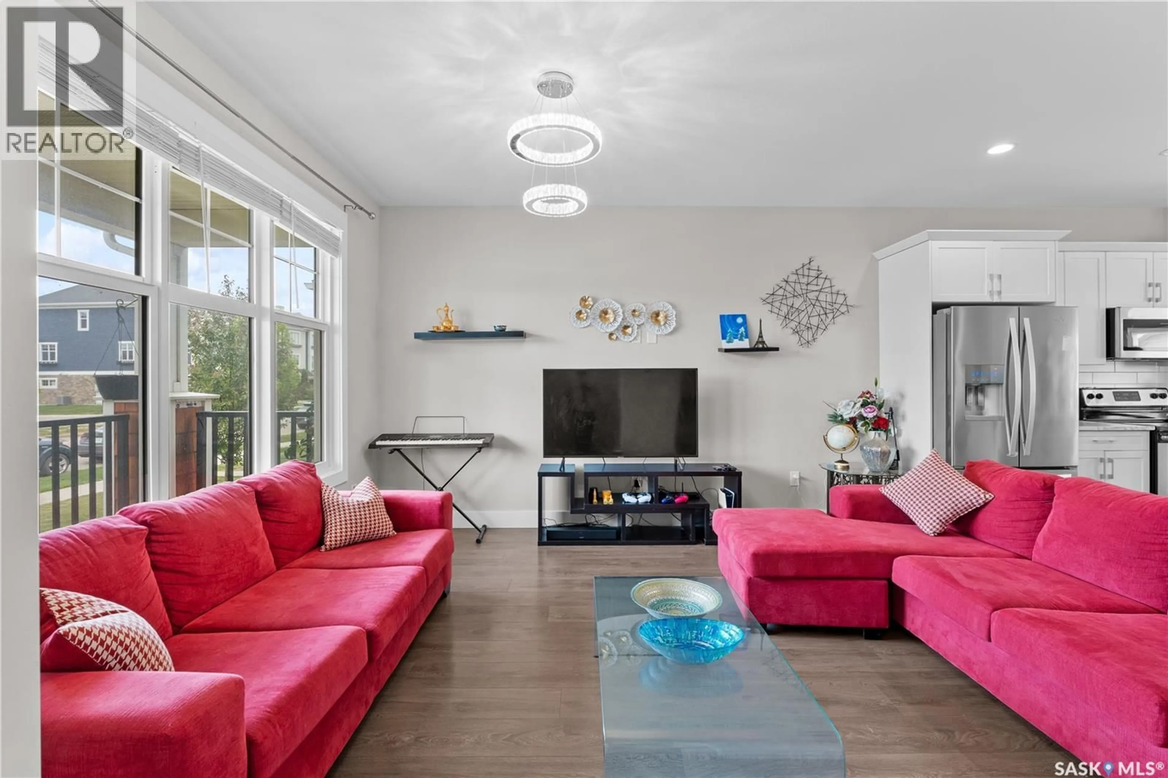 Living room with furniture, unknown for 676 MEADOWS BOULEVARD, Saskatoon Saskatchewan S7V0M5