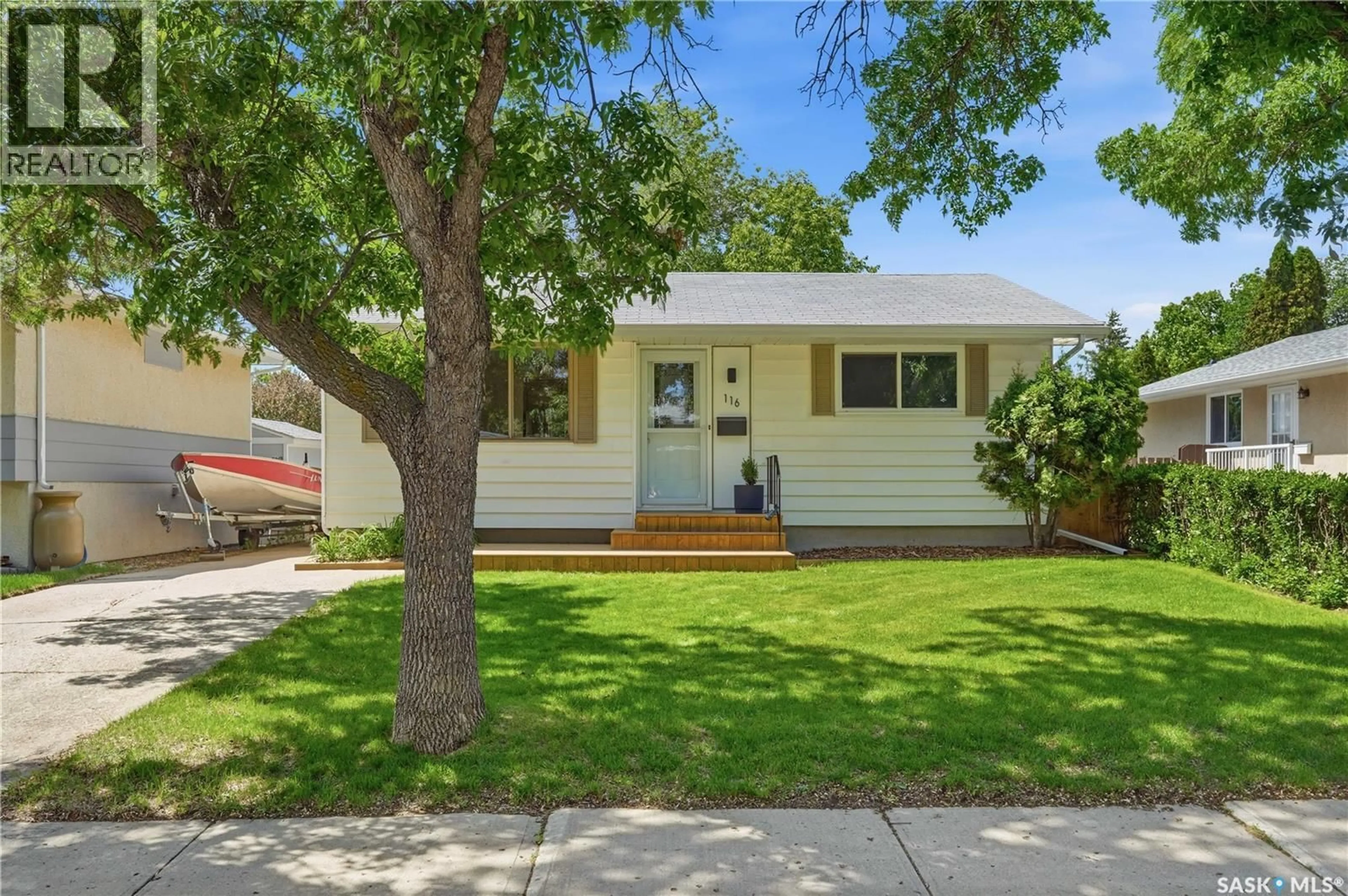 Home with vinyl exterior material, street for 116 STRAUB STREET, Regina Saskatchewan S4T6G8