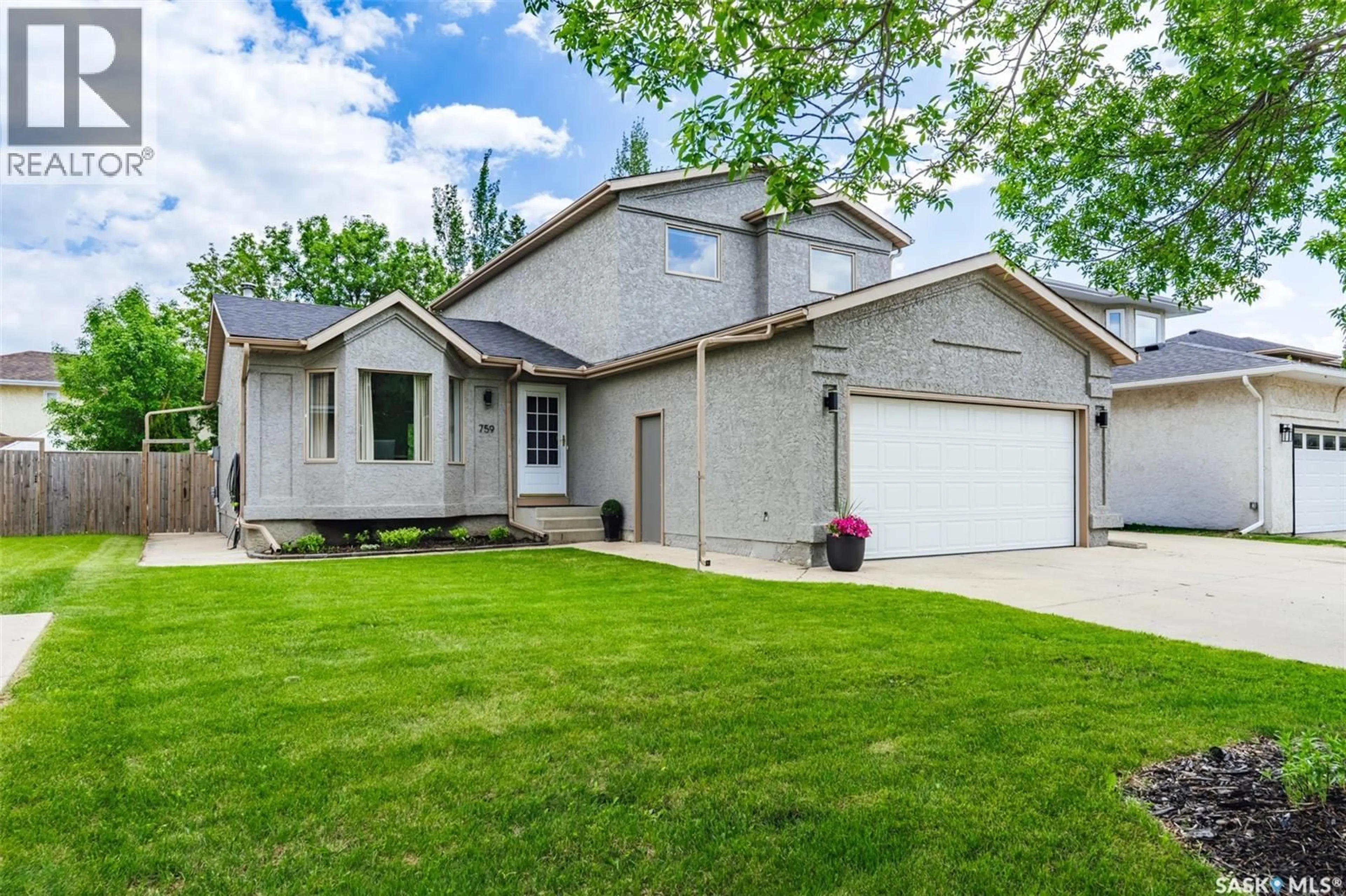 Home with vinyl exterior material, street for 759 COWLEY ROAD, Saskatoon Saskatchewan S7N4J1